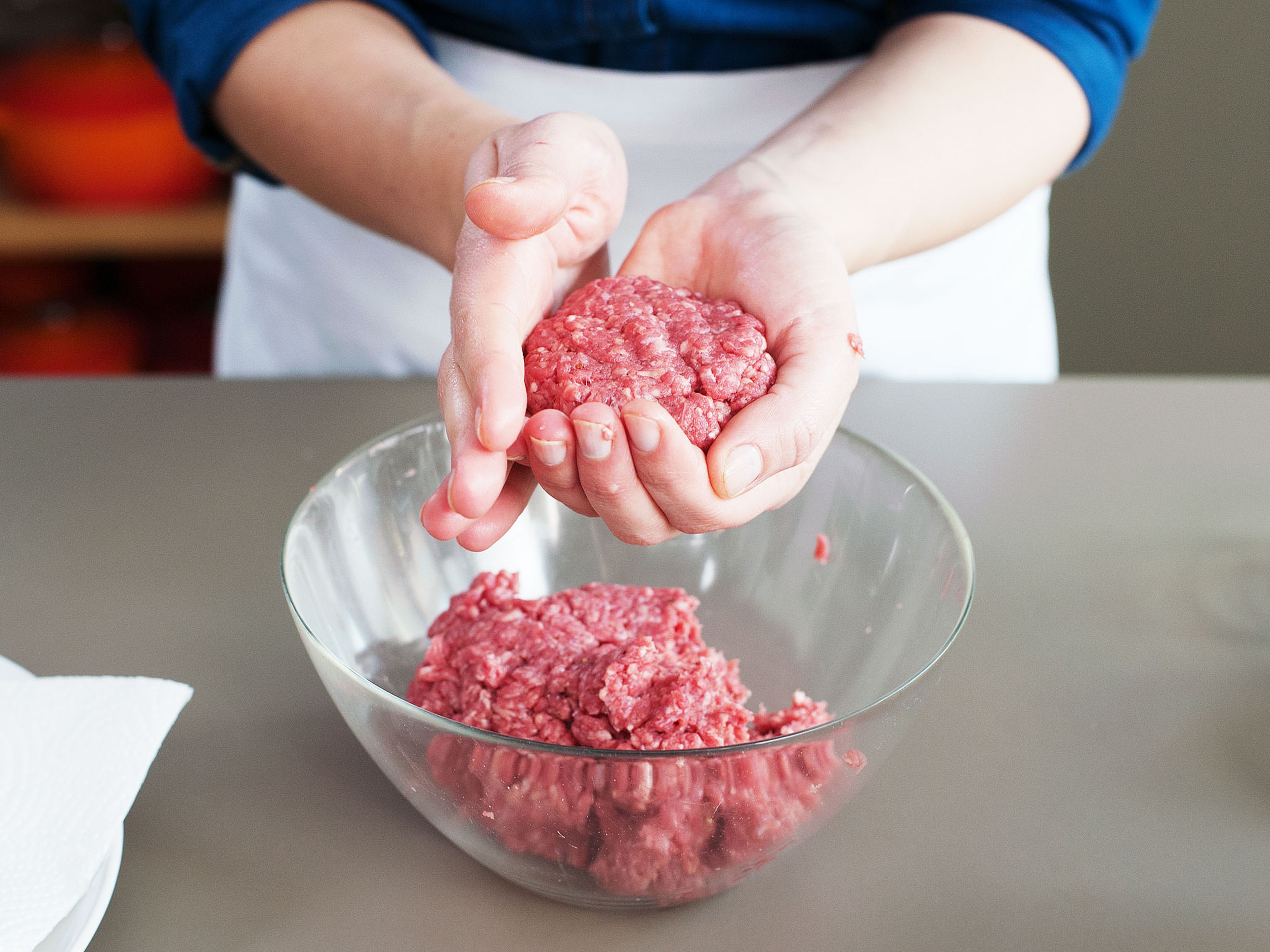 For the patties, season ground beef with salt and pepper.