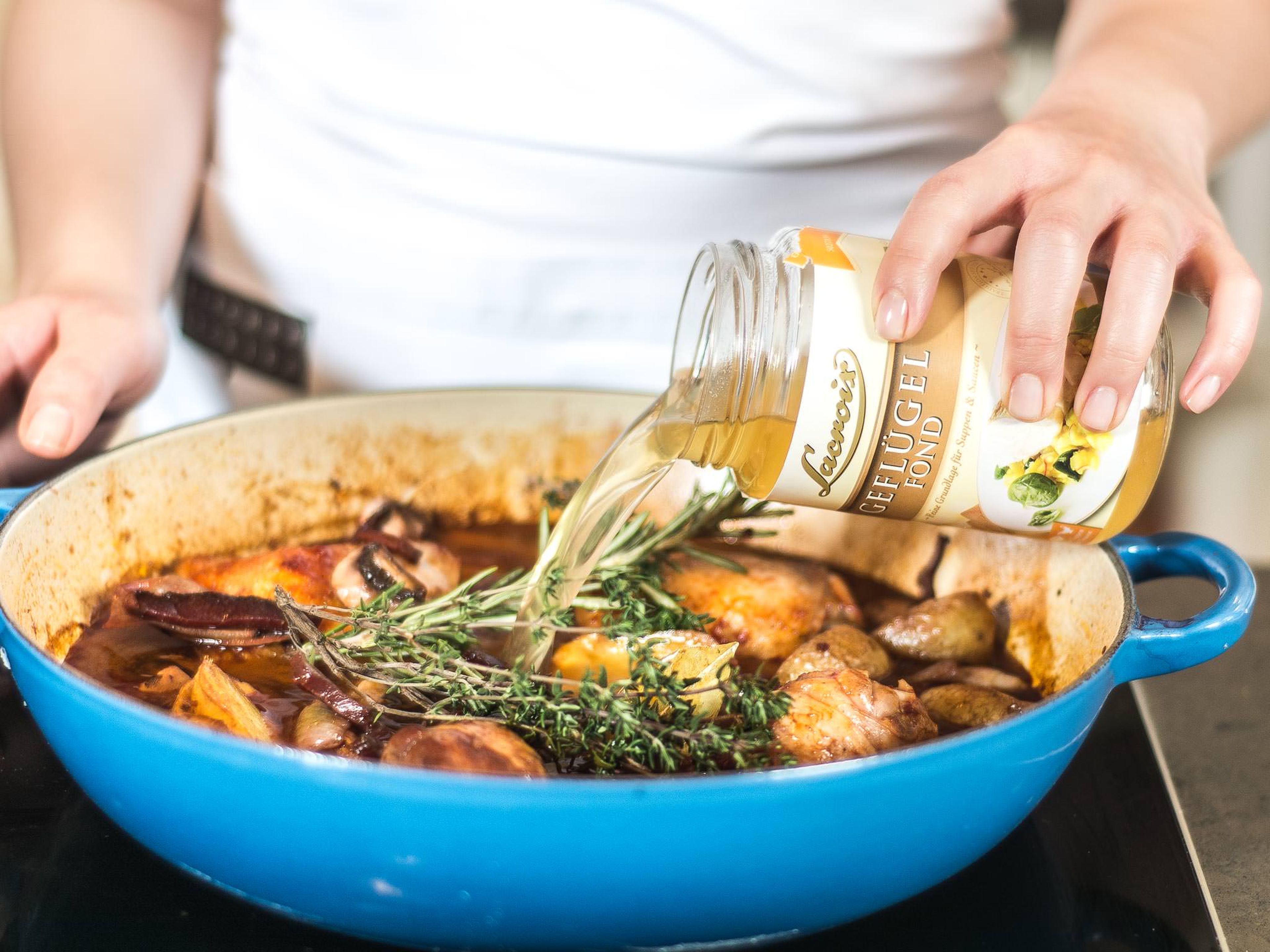 Pour in remaining red wine and chicken stock. Add bay leaf, thyme, and rosemary and let simmer for approx. 30 – 35 min. with closed lid on medium heat.