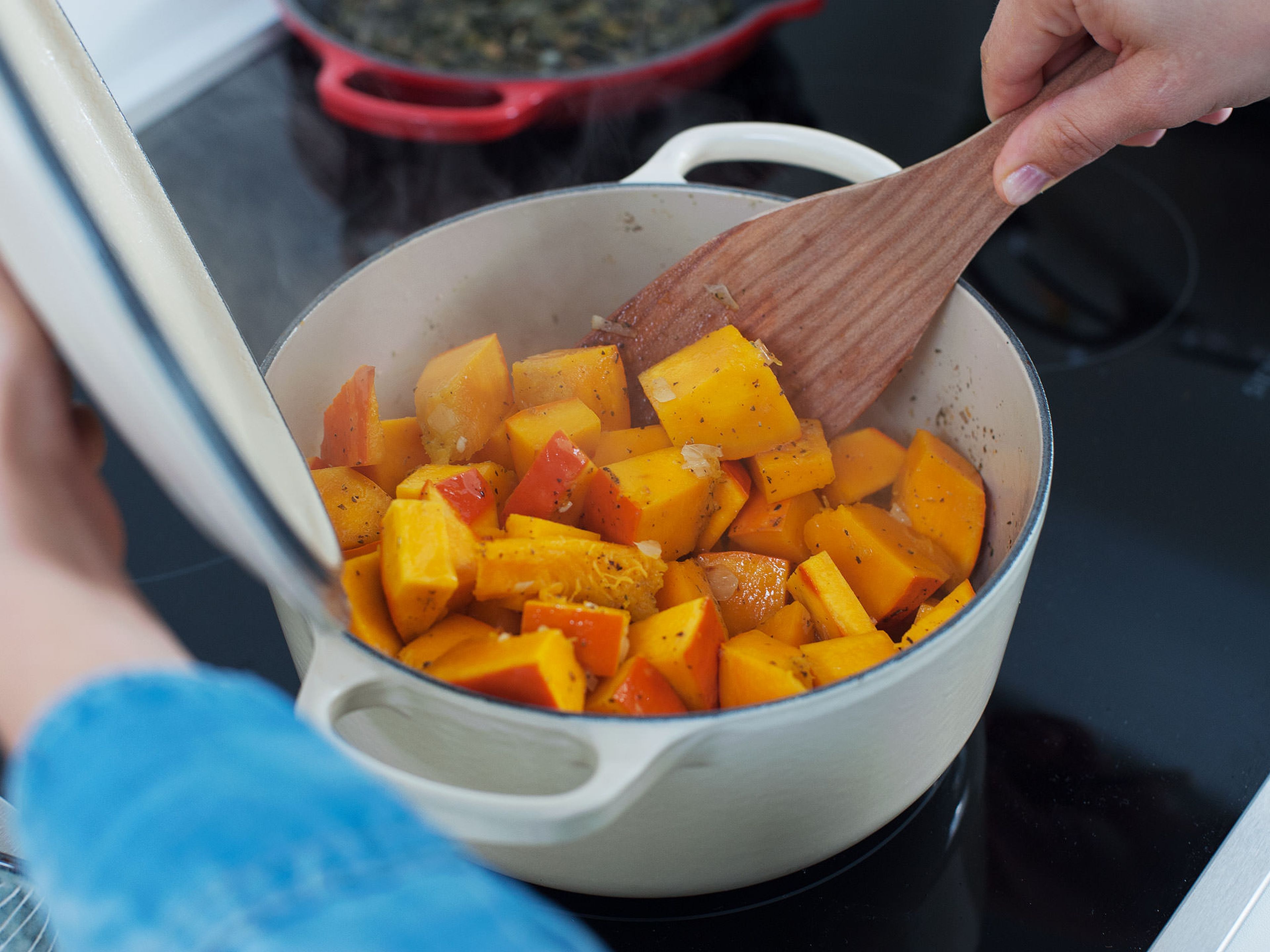 Add cubed pumpkin to pot and cook for another 3 – 4 min., stirring occasionally.