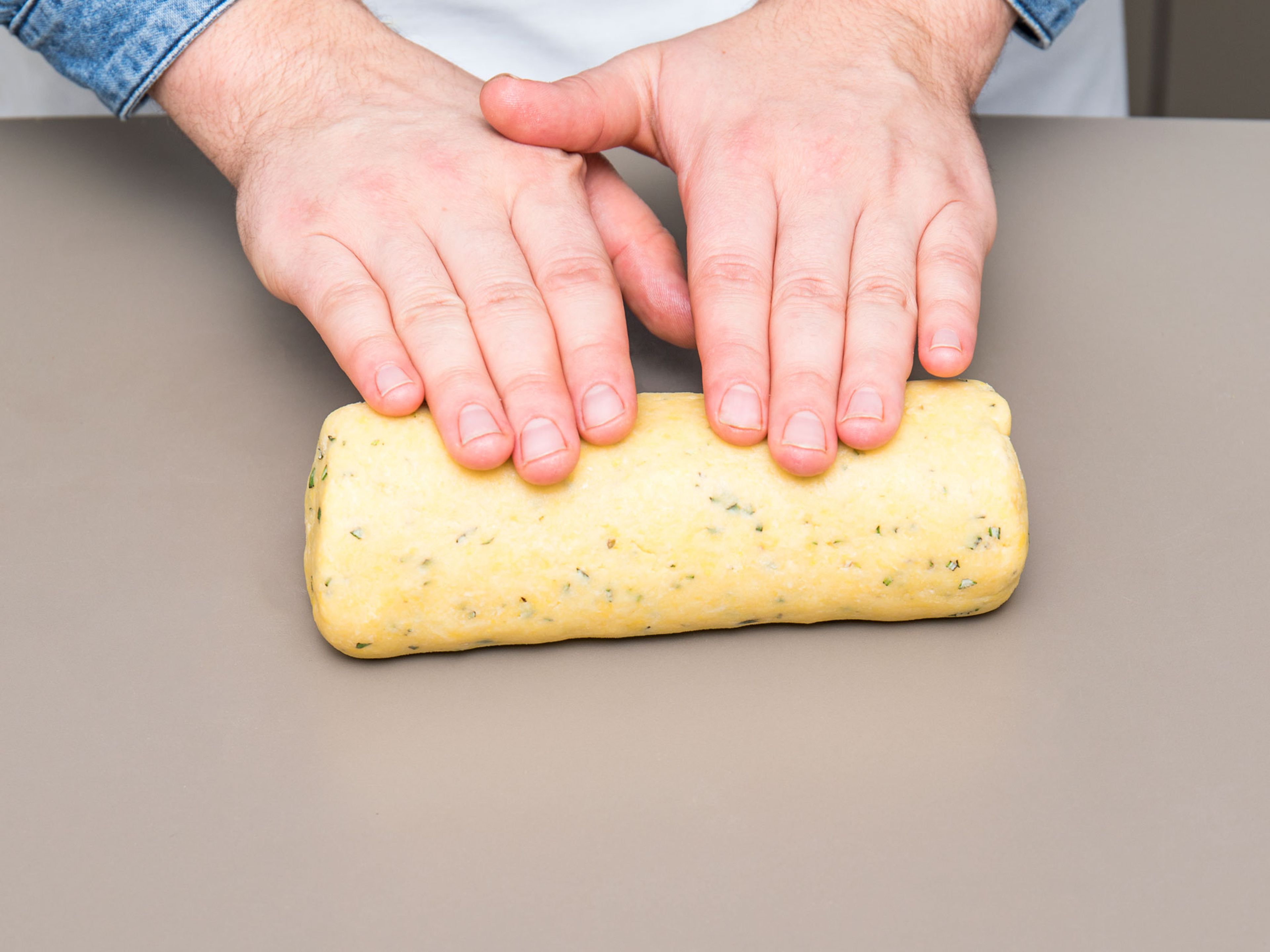 Knead the dough on medium speed for approx. 2 – 3 min. until a crumbly dough forms. Turn dough out on a floured work surface, knead a bit, and form into a roll (5cm/2in.). Form into a log, wrap dough in plastic wrap, and refrigerate for approx. 60 min.