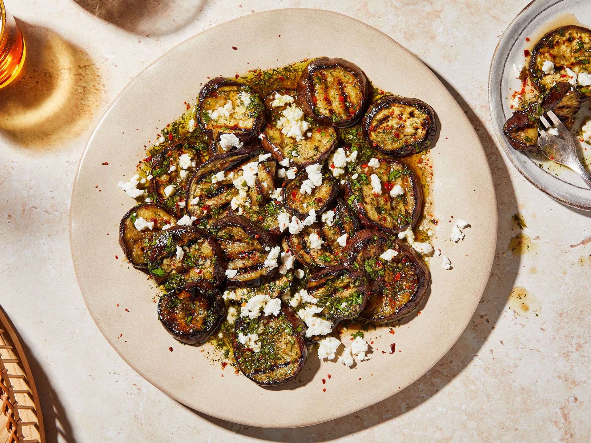 Grilled eggplant with herby garlic dressing