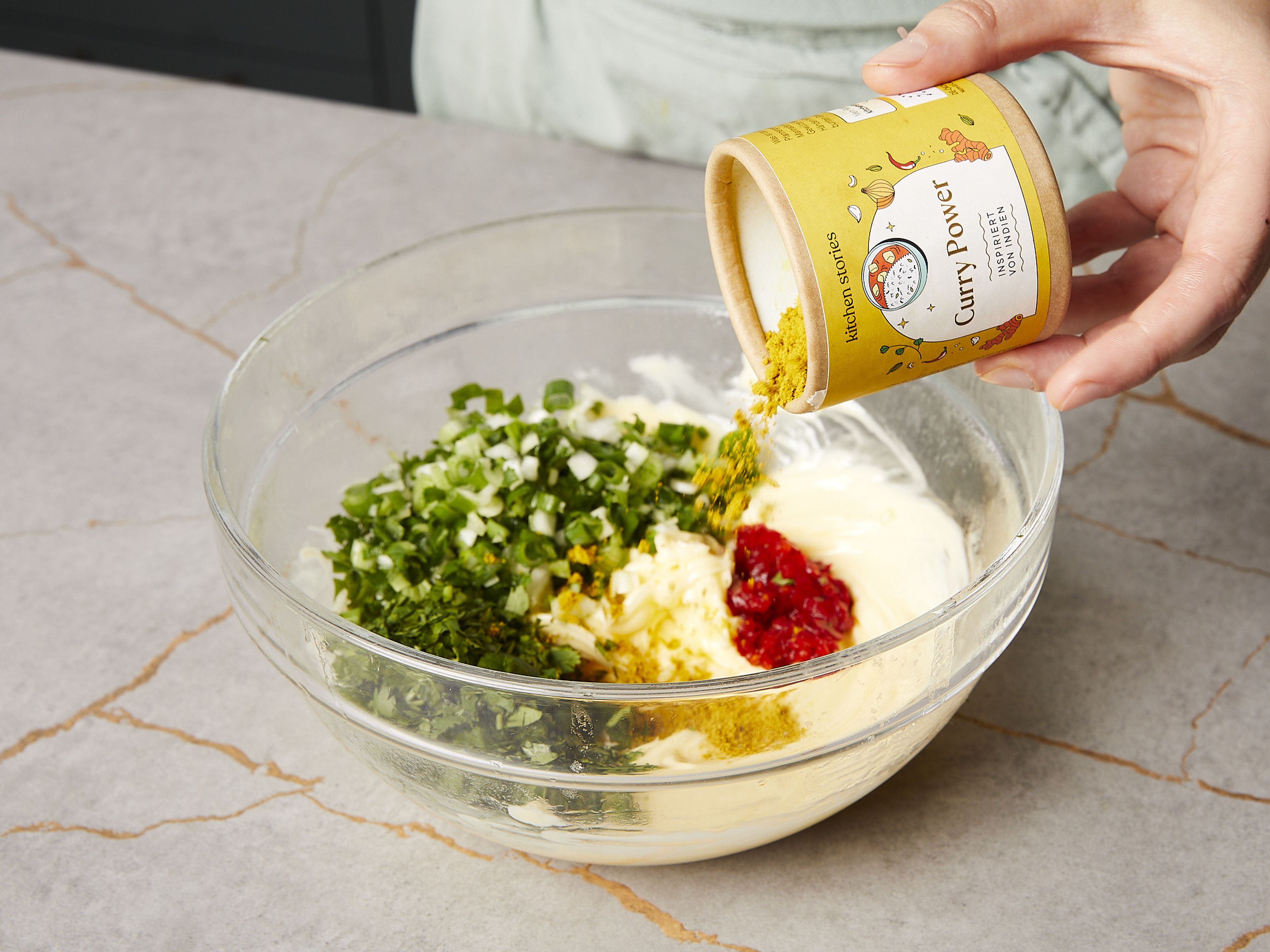 In a bowl, mix soft butter with scallion, coriander, chili and our CURRY POWER seasoning. Season with salt to taste and roll in plastic wrap, store in the refrigerator until ready to serve. Serve with bread, grilled meat or corn.