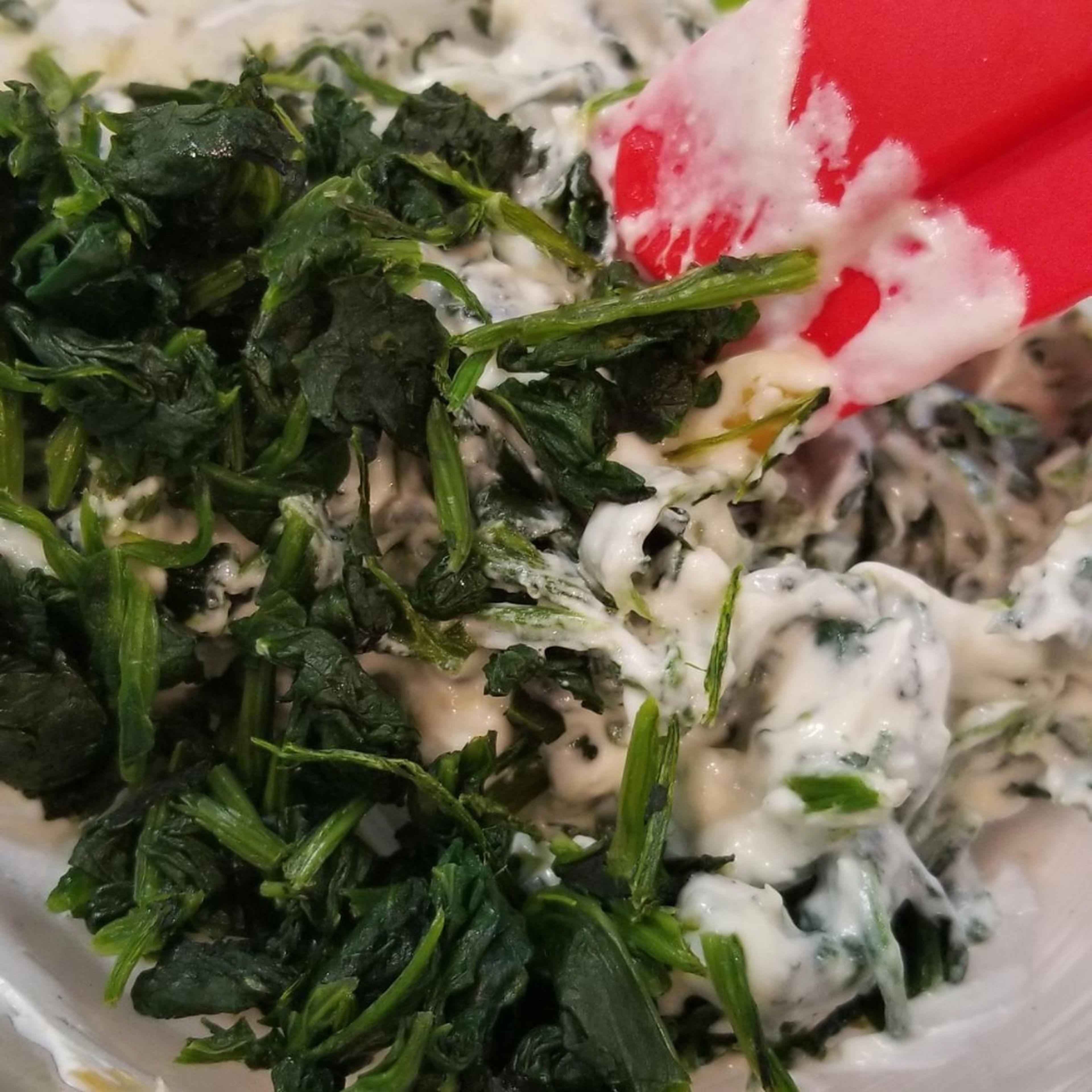 Mix the spinach in with the Gournay cheese. you can substitute this cheese with cream cheese.