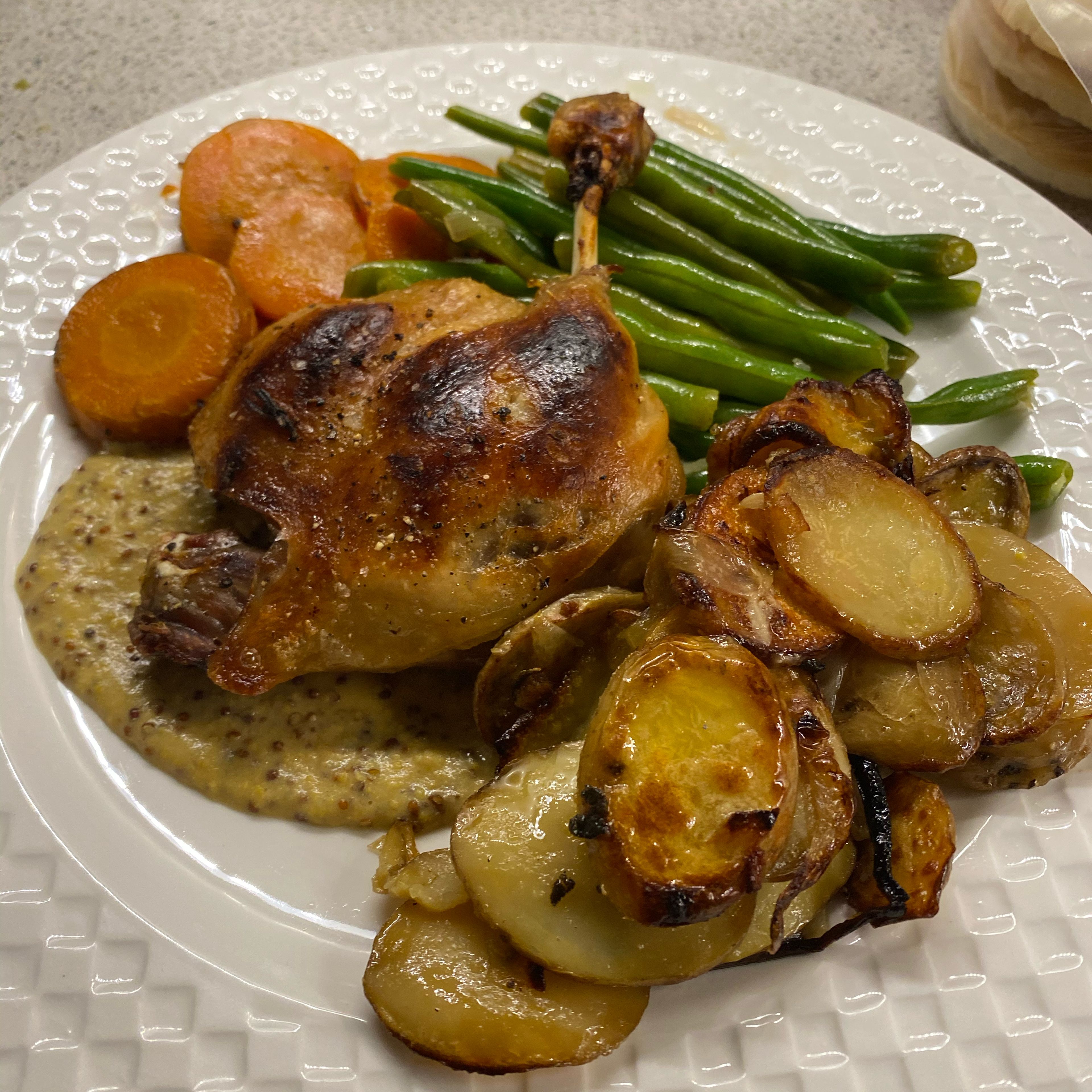 I made a Dijon cream sauce (Dijon, whole grain mustard and a bit of cream, warmed for a couple mins and finished with half Tbs of butter) to serve with the duck and blanched string beans tossed in duck fat. It would also be great with a sharp vinaigrette salad.