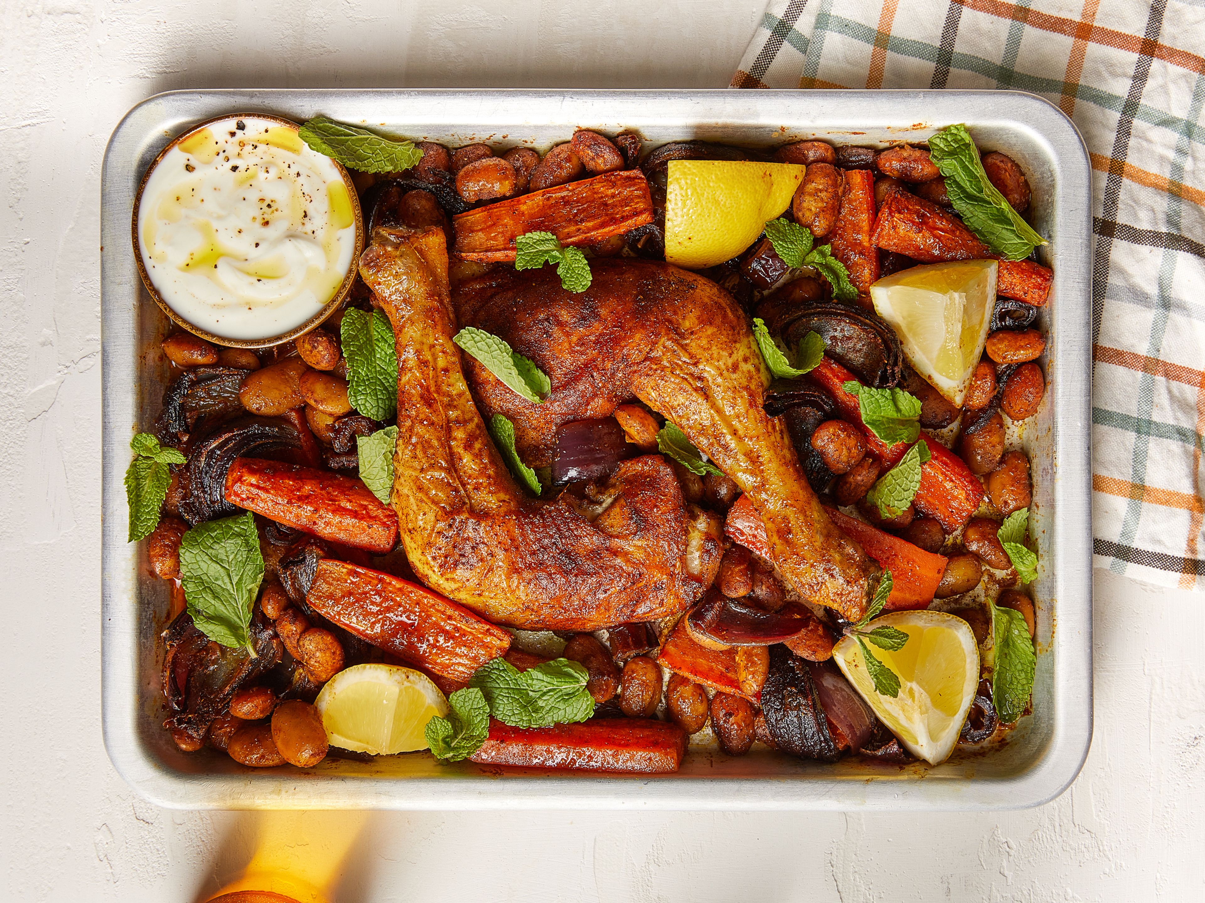 Spiced sheet pan chicken with dates and beans