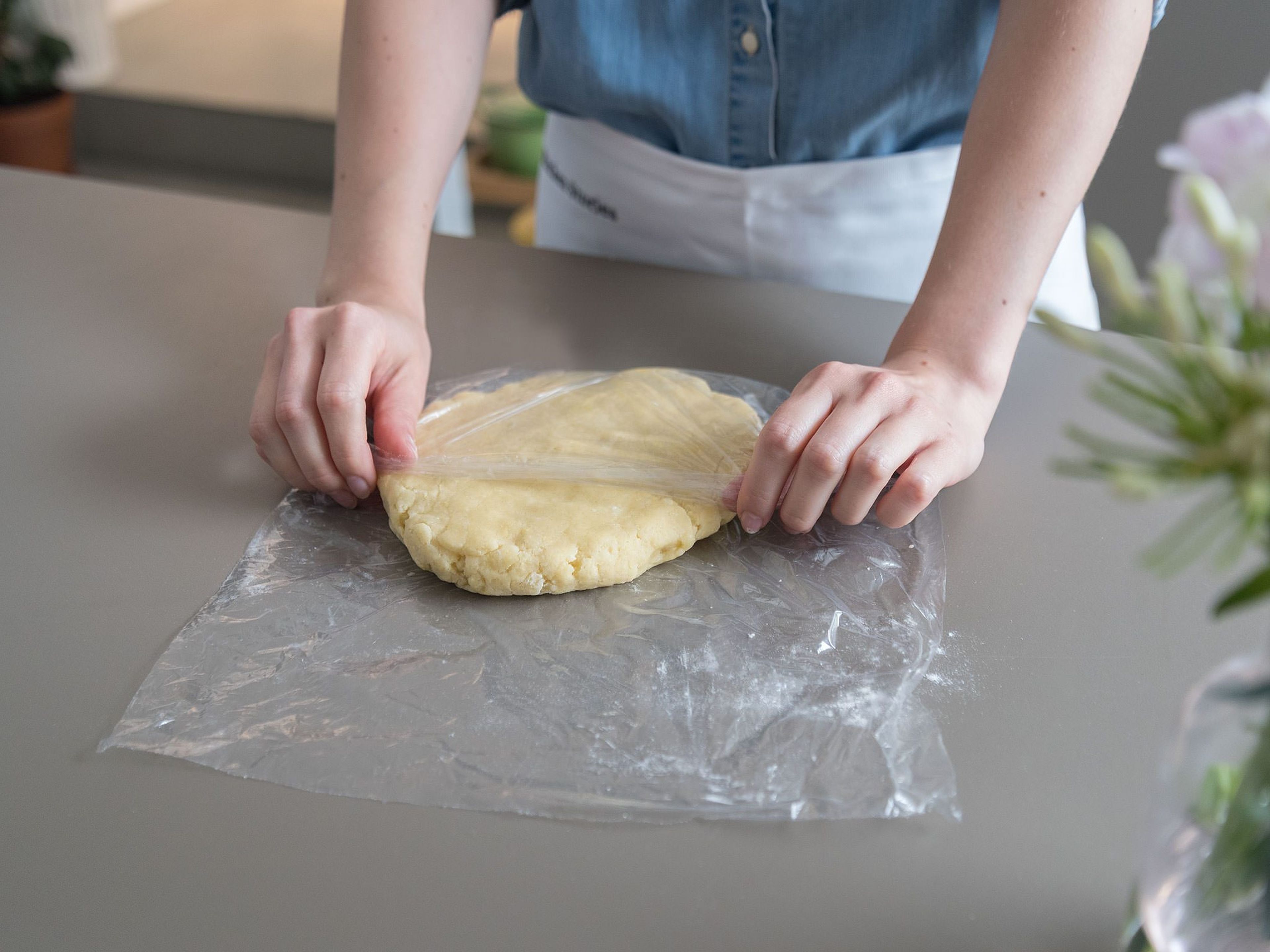 Add flour, baking powder, sugar, and salt to a large mixing bowl and stir to combine. Cut cold butter into cubes and work into flour mixture with dough scraper until butter is divided into pea-sized pieces. Add egg and continue mixing, bringing dough together using your hands. Form into a disc and wrap tightly in plastic wrap. Leave to chill for approx. 30 min. in the refrigerator.