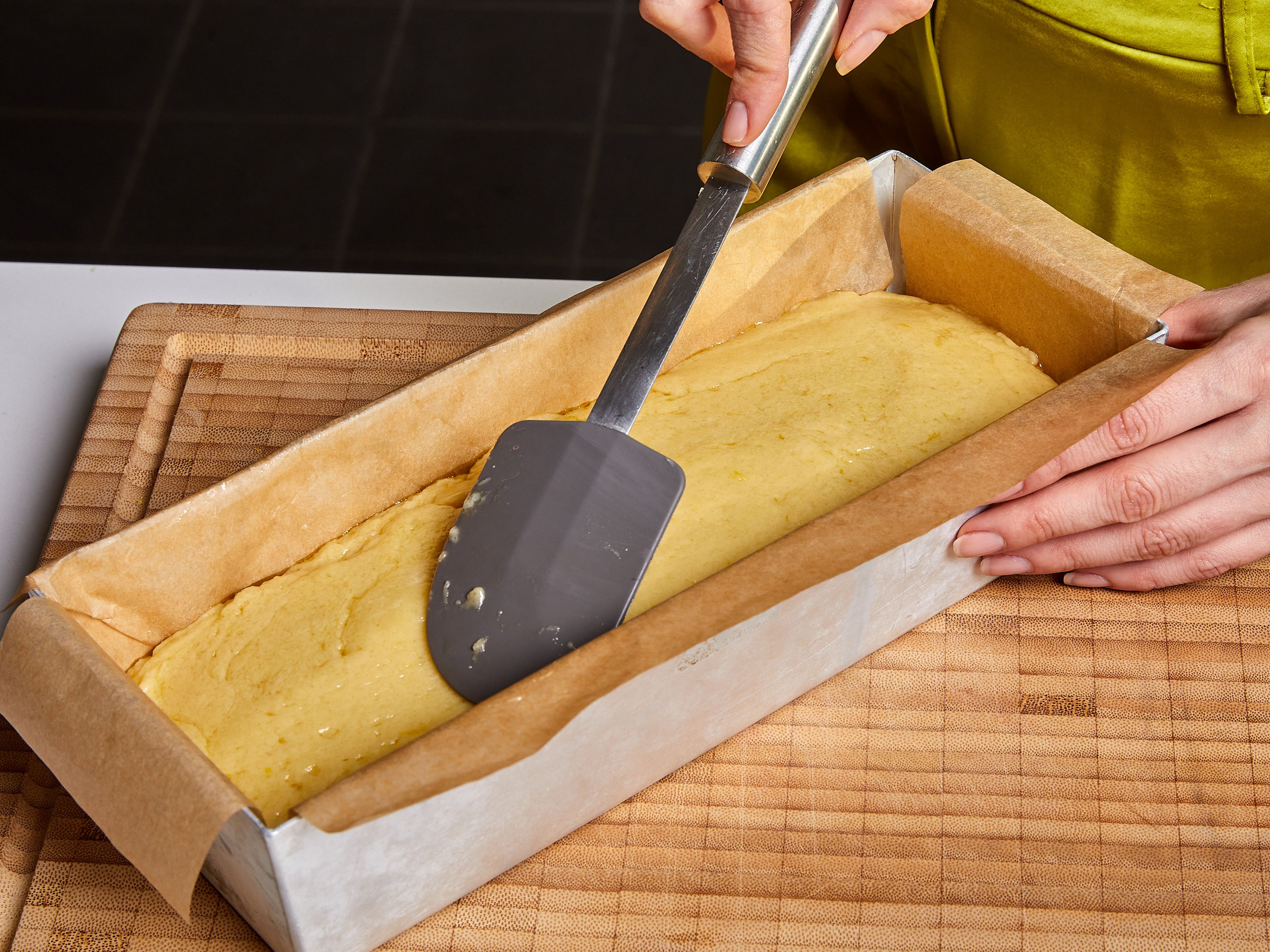 Pour the batter into the loaf tin. Smooth it out if necessary. Transfer it in the preheated oven and bake the cake for approx. 50–55 min. If a skewer or fork pokes through without wet batter, the cake is ready.