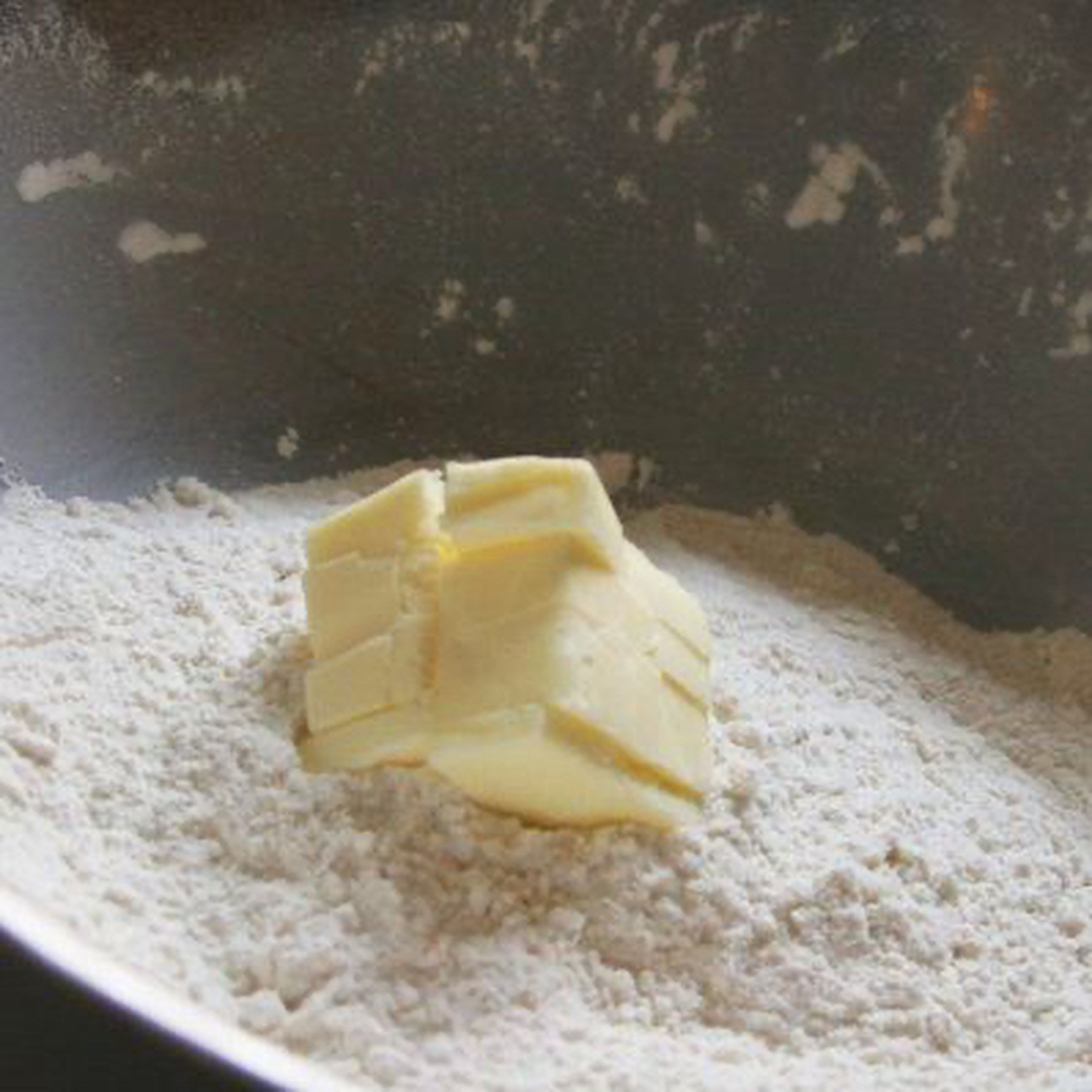 Add flour to melted butter and mix