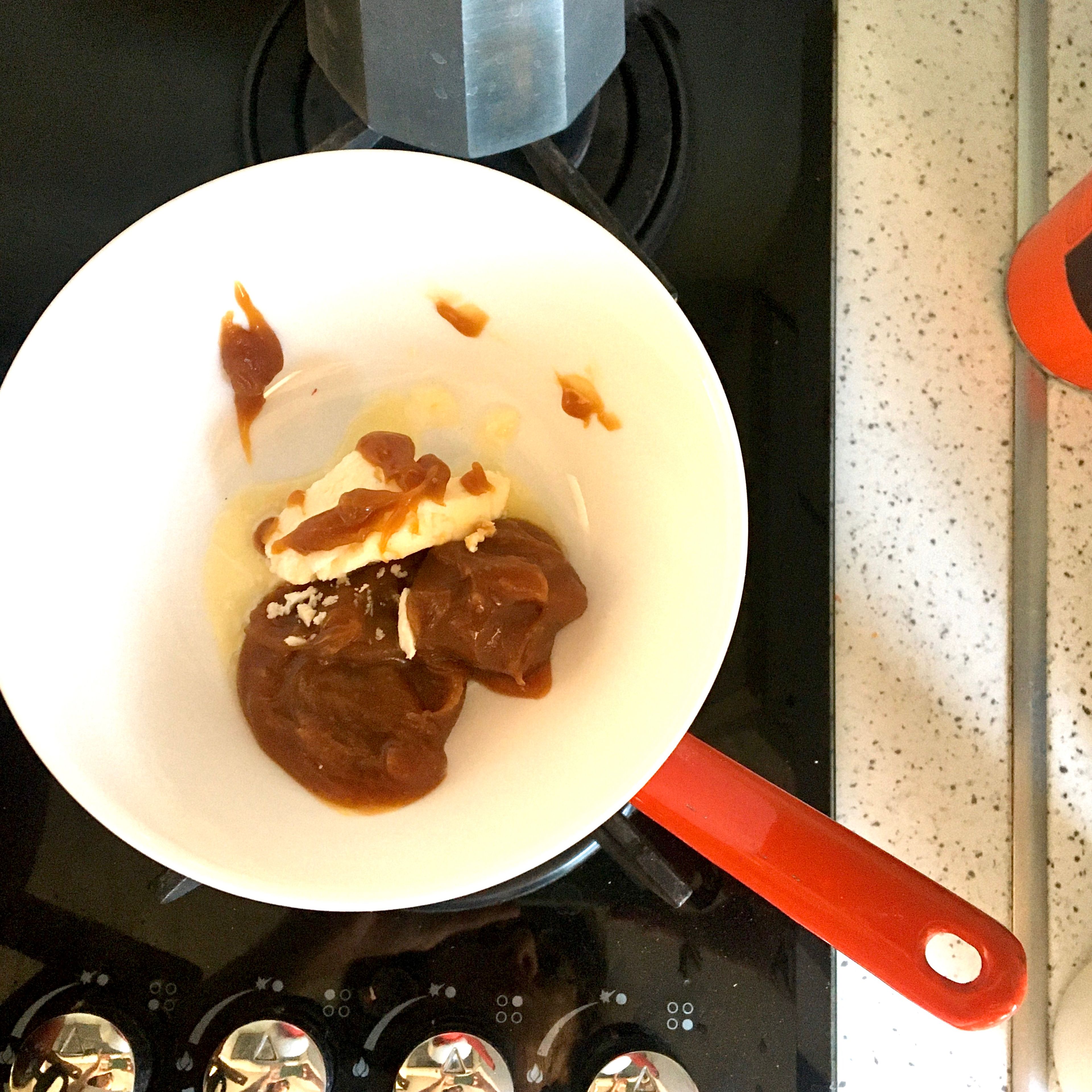 Add the butter and caramel to a small bowl set over a pot of simmering water. Remove from the heat as they start melting. Chop the chocolate, reserve a tbsp for decoration, add the rest along with the cocoa powder to the bowl. Stir until smooth.