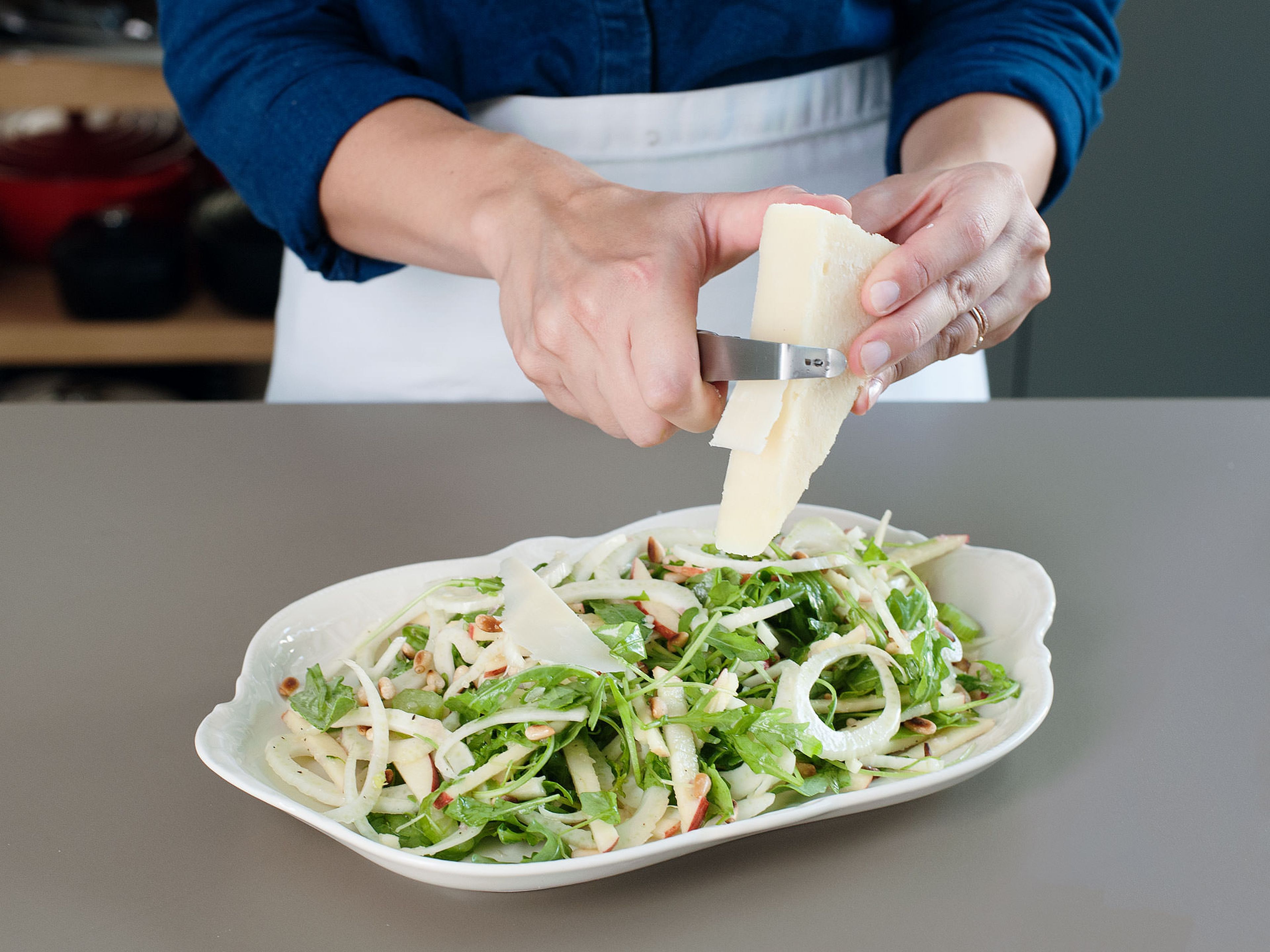 Transfer salad to a serving platter and garnish with shavings of pecorino, pine nuts, and chopped tarragon. Enjoy!