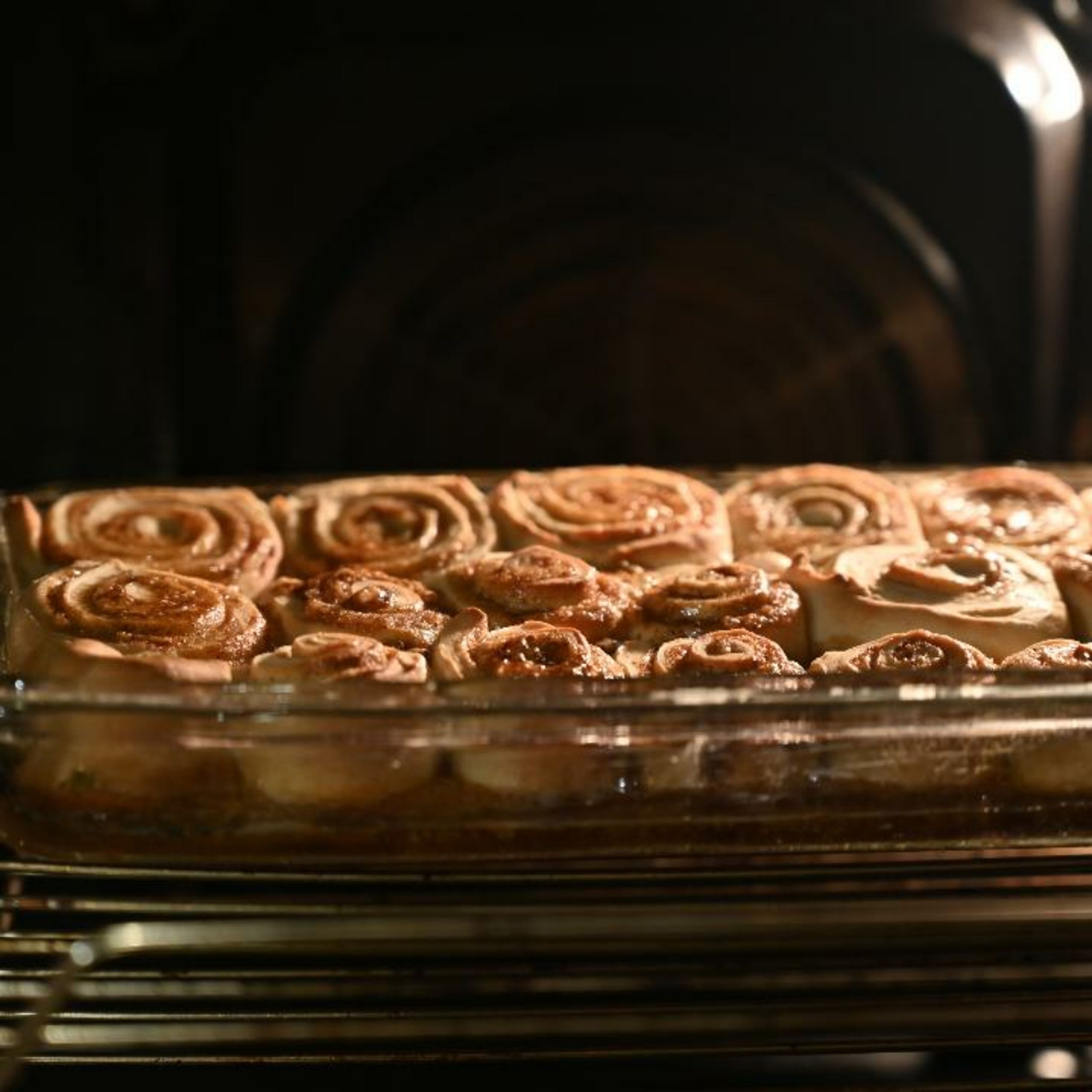 Bake the cinnamon rolls at 180°c C for 20-25 minutes.