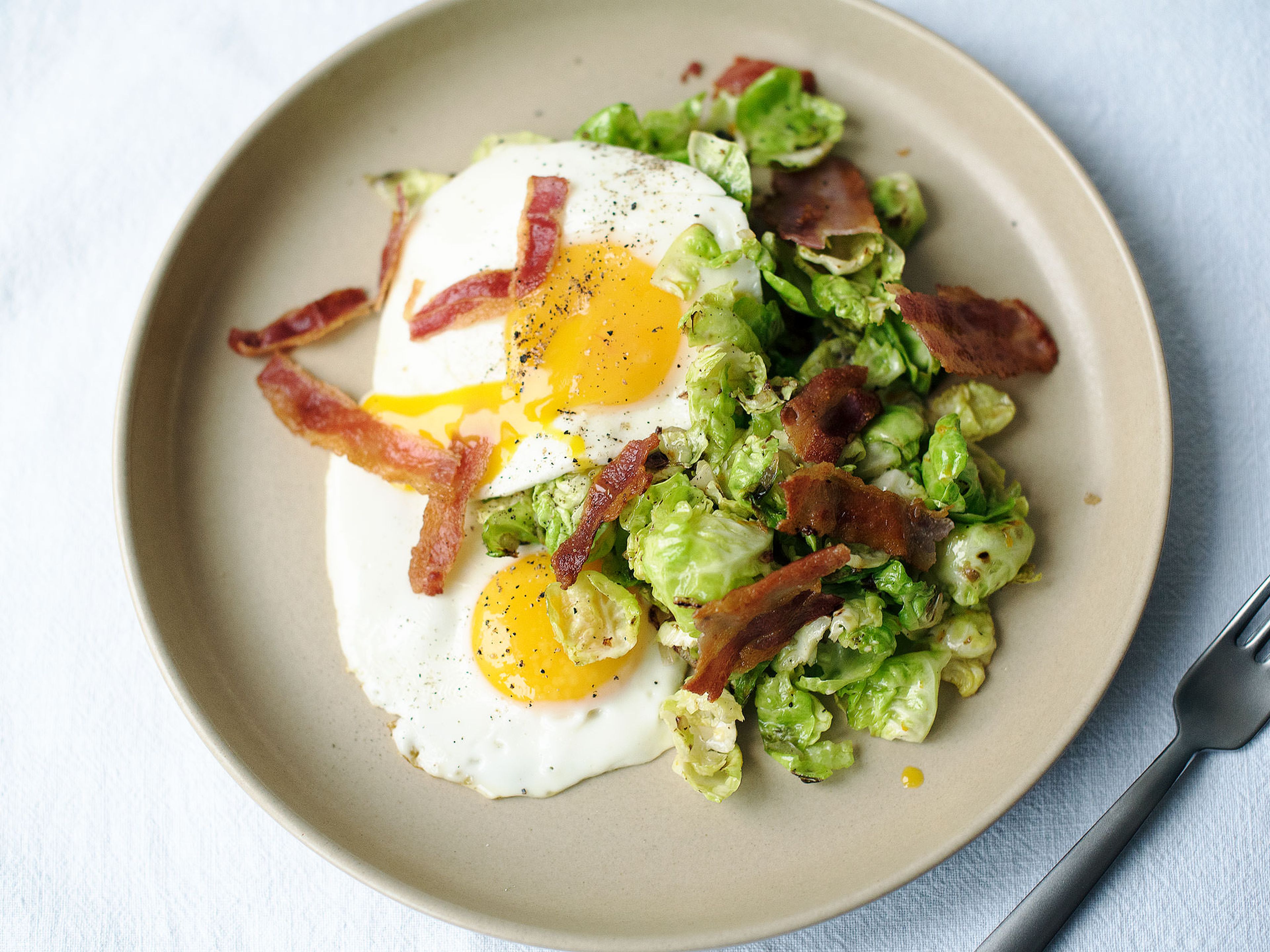 Brussels sprout hash with bacon and fried eggs