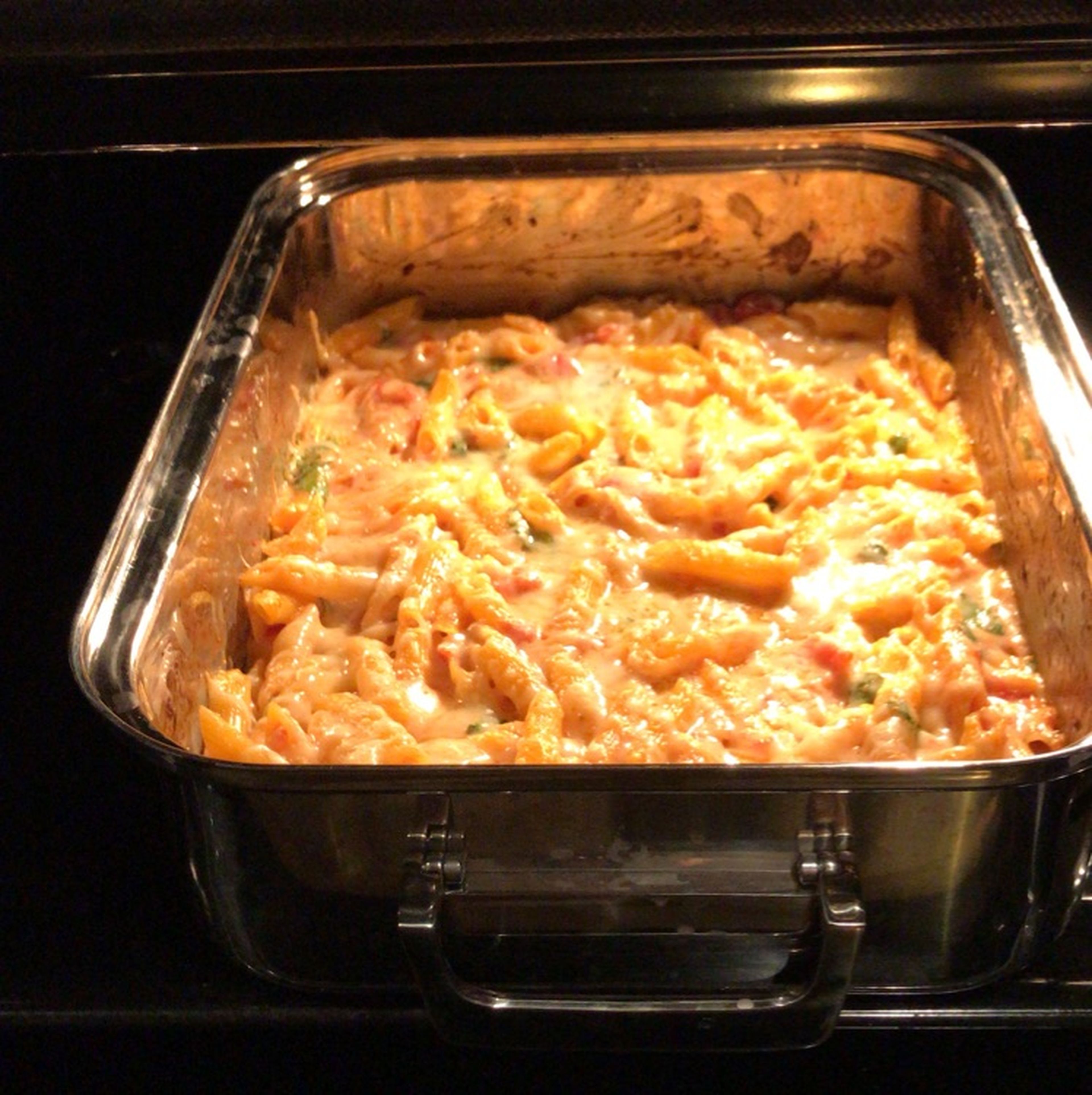Four-cheese and tomato baked penne