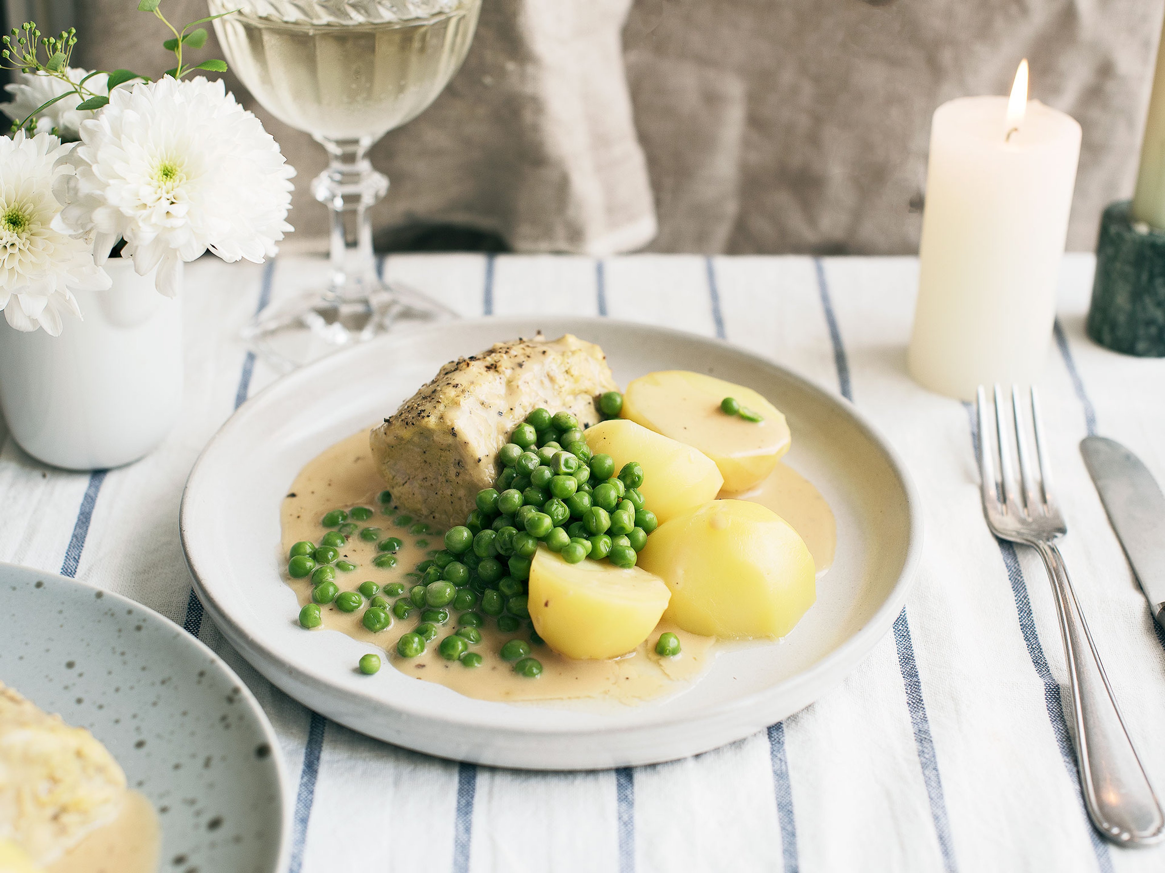 Schweinefilet mit Kartoffeln und Erbsen