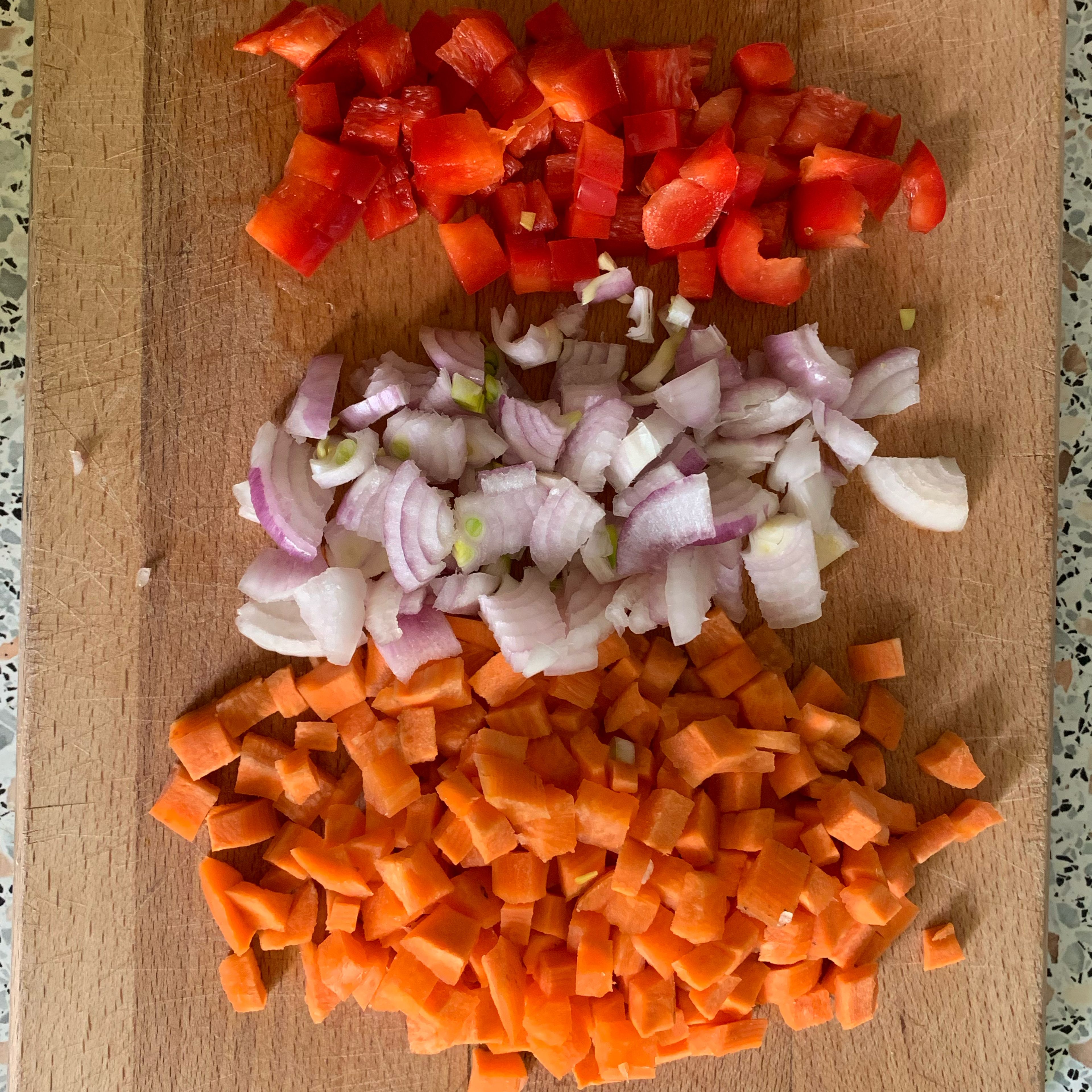 While boiling beans, chop onions, sweet pepper, carrot ( I prefer mini cubes).