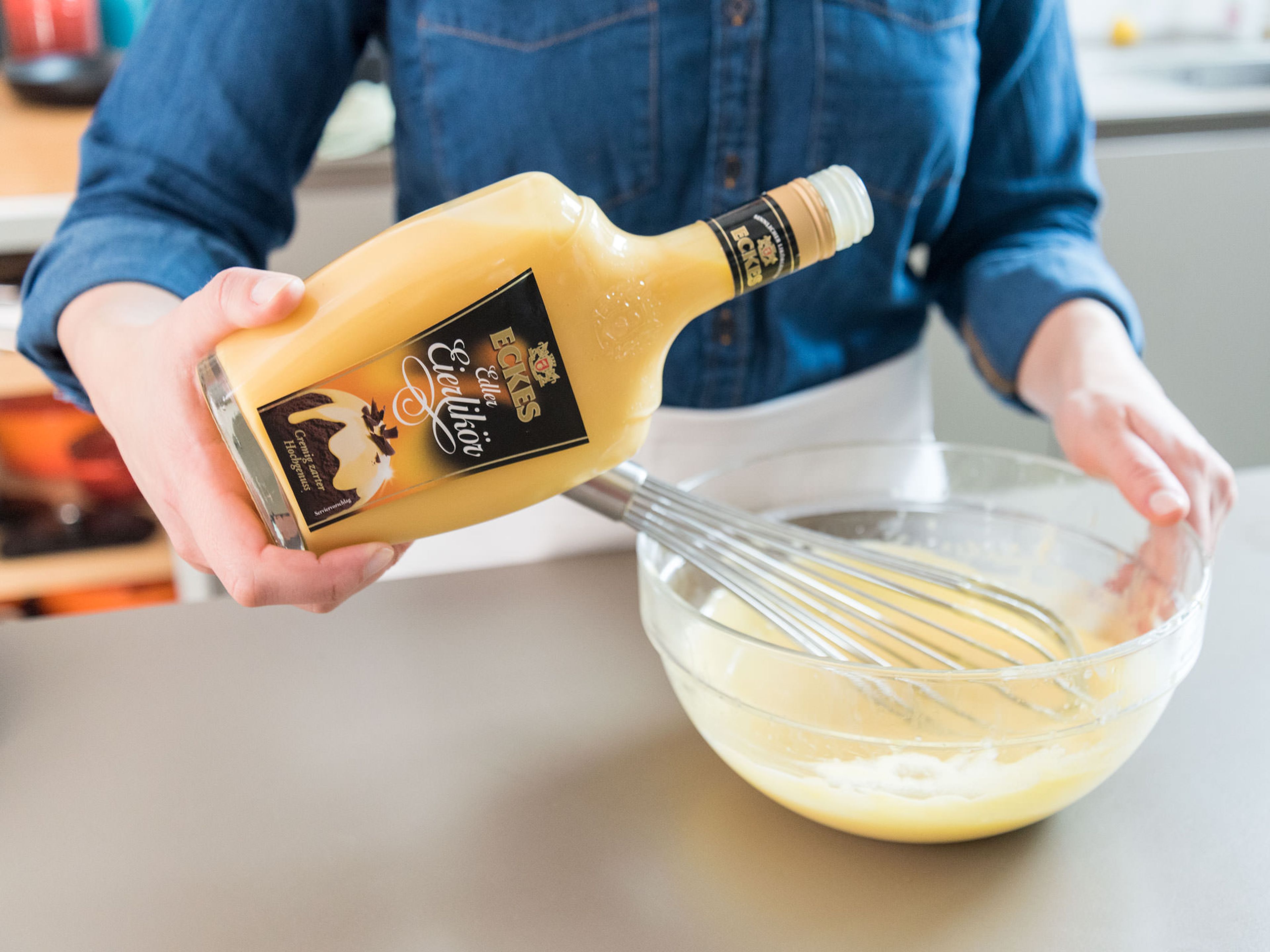 Remove from heat, whisk in eggnog and set aside.
