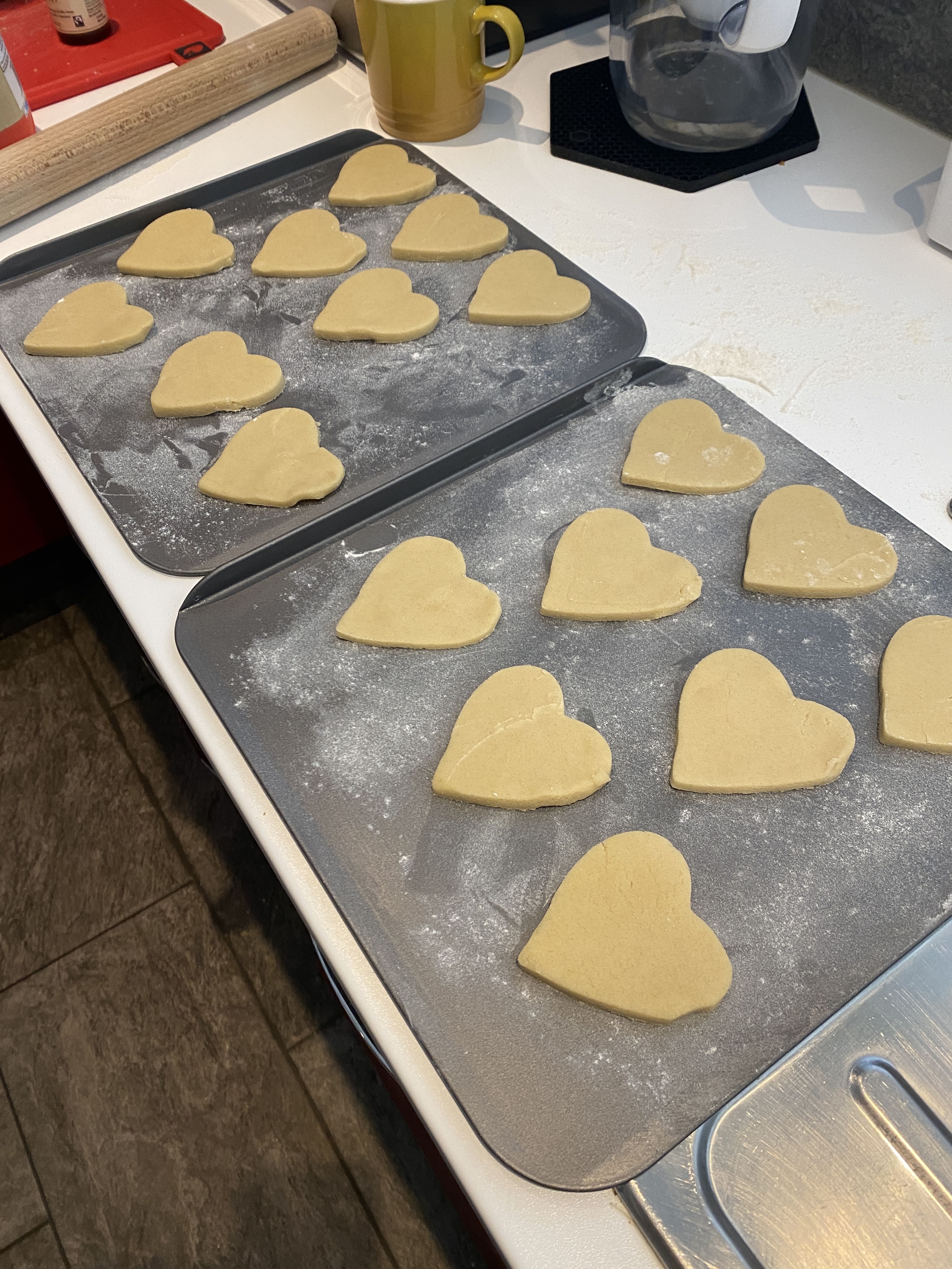 Arrange the hearts on a lightly greased baking tray (cookie sheet), with good space in between them. I used two trays to accommodate 17 biscuits. Bake in a preheated oven, 180C/350F/Gas Mark 4 for 15-20 minutes until the hearts are a light golden colour.