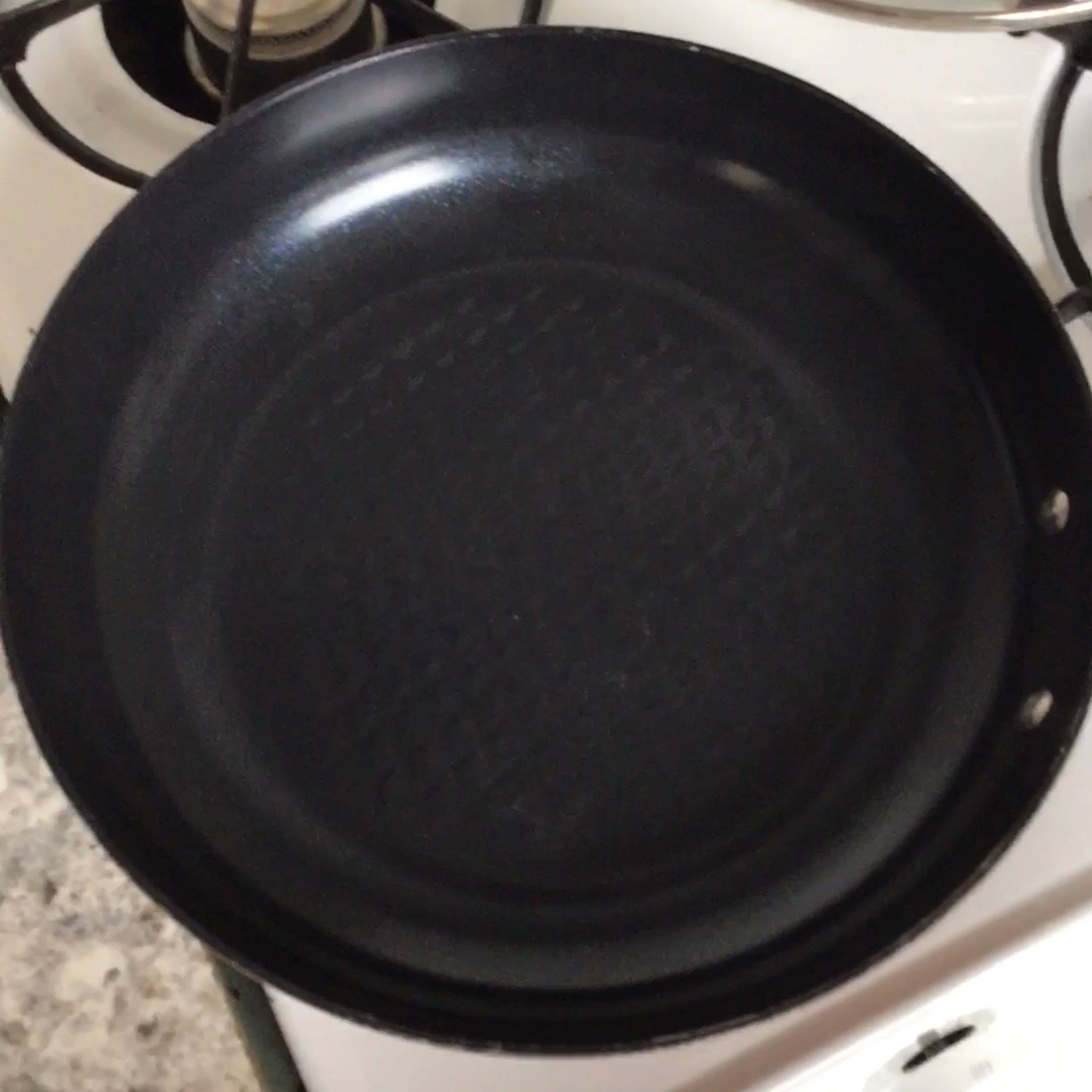 -Drizzle your olive oil (canola oil or coconut also works). And turn on medium heat.