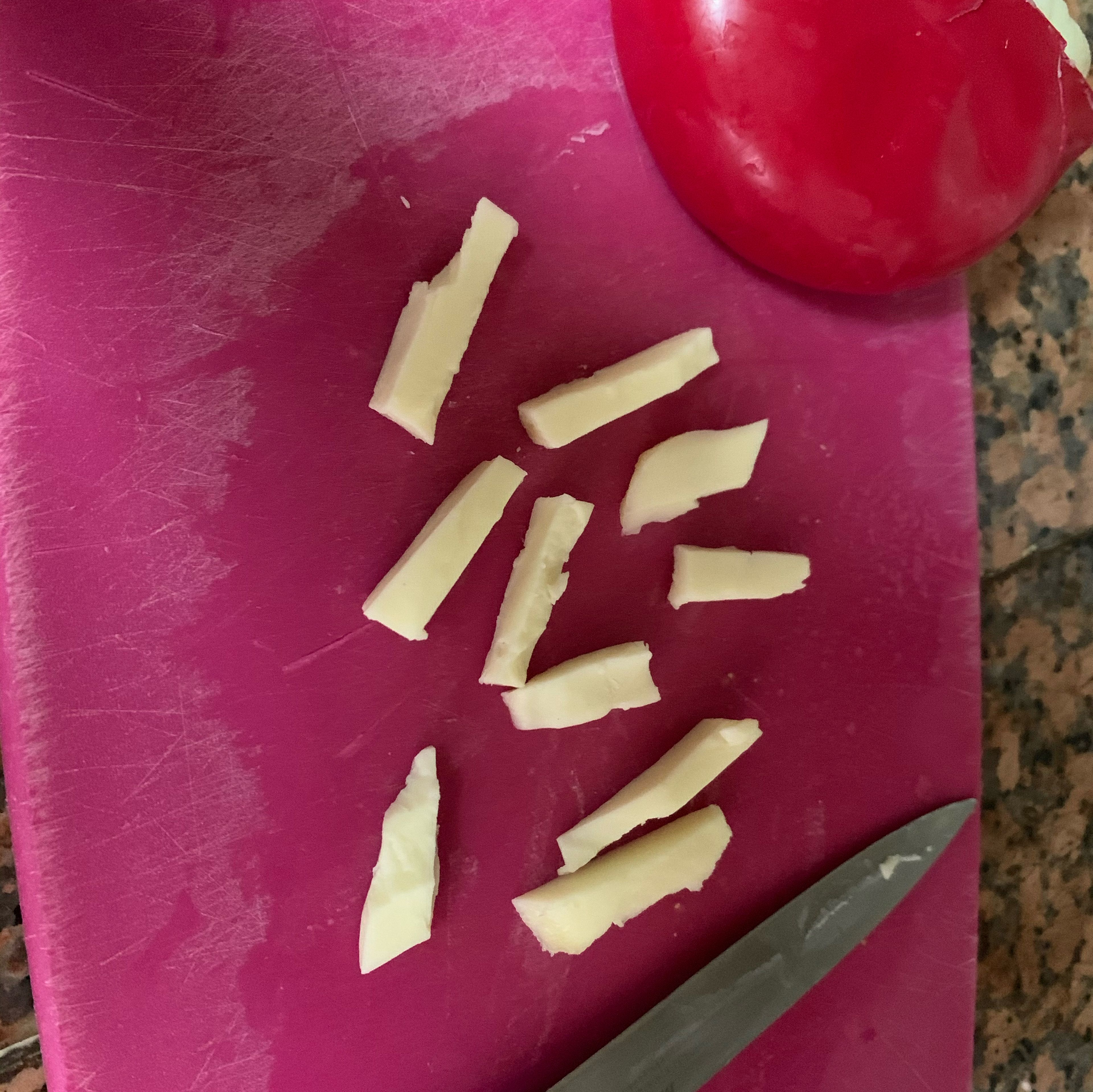 Slice the Gouda cheese