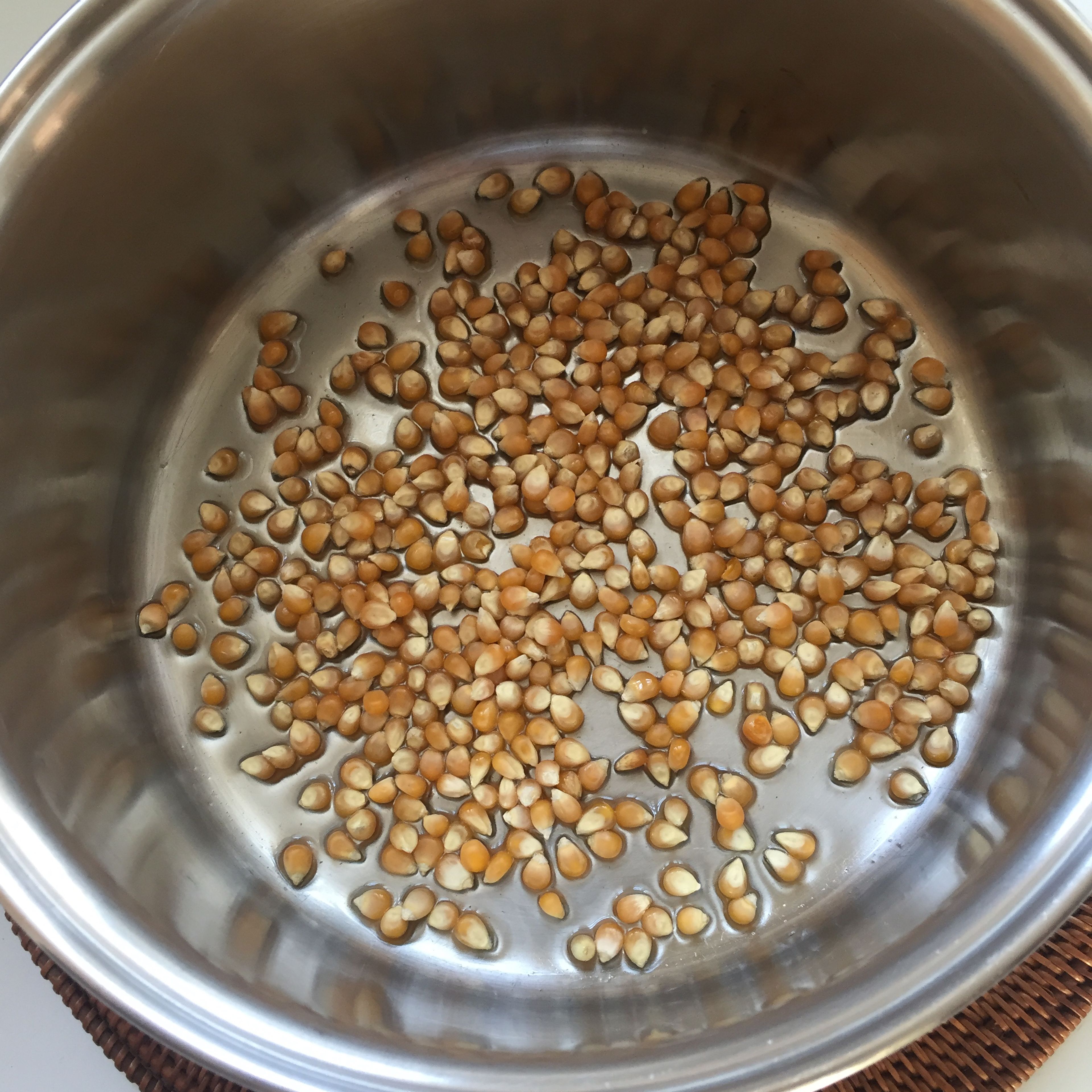 Once spread, cover pot and heat over medium-high heat until all kernels are popped. This should take about 5-8 minutes. Shake the pot occasionally to avoid getting burnt popcorn