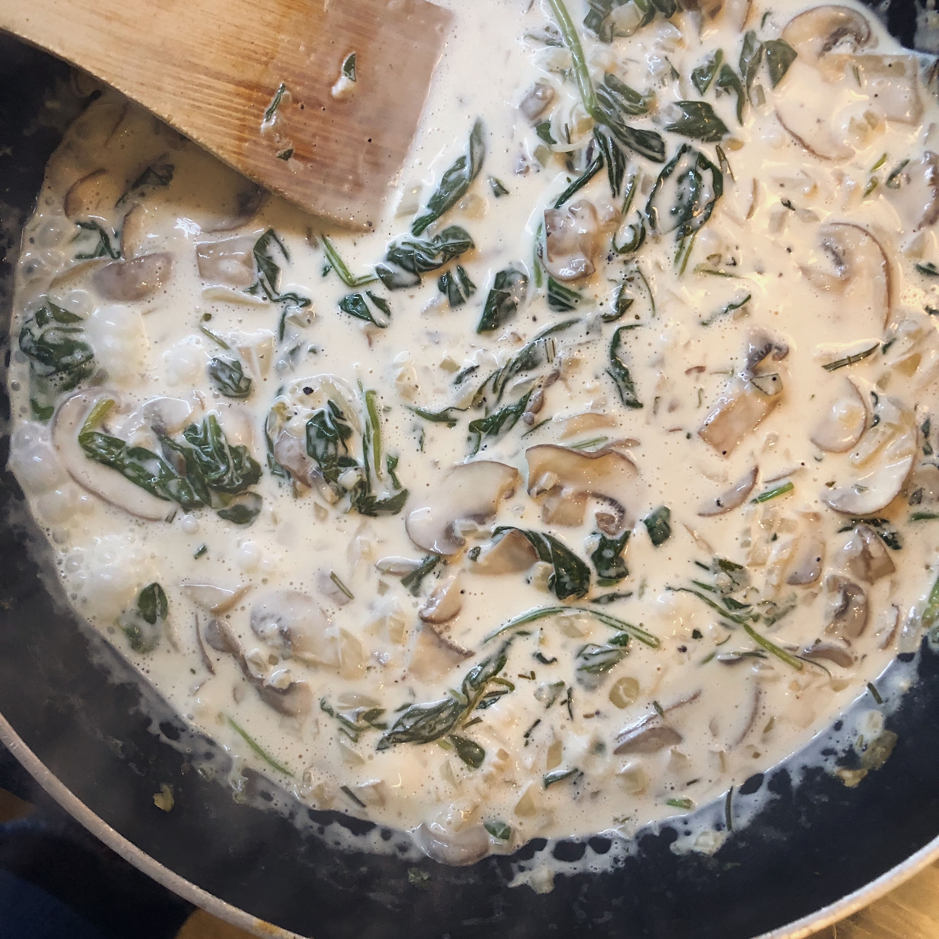 Turn heat up and add white wine and simmer for 5 minutes. Then add cream, soy sauce, lemon juice and dried oregano. Simmer on a low heat for 15 minutes, stirring occasionally.