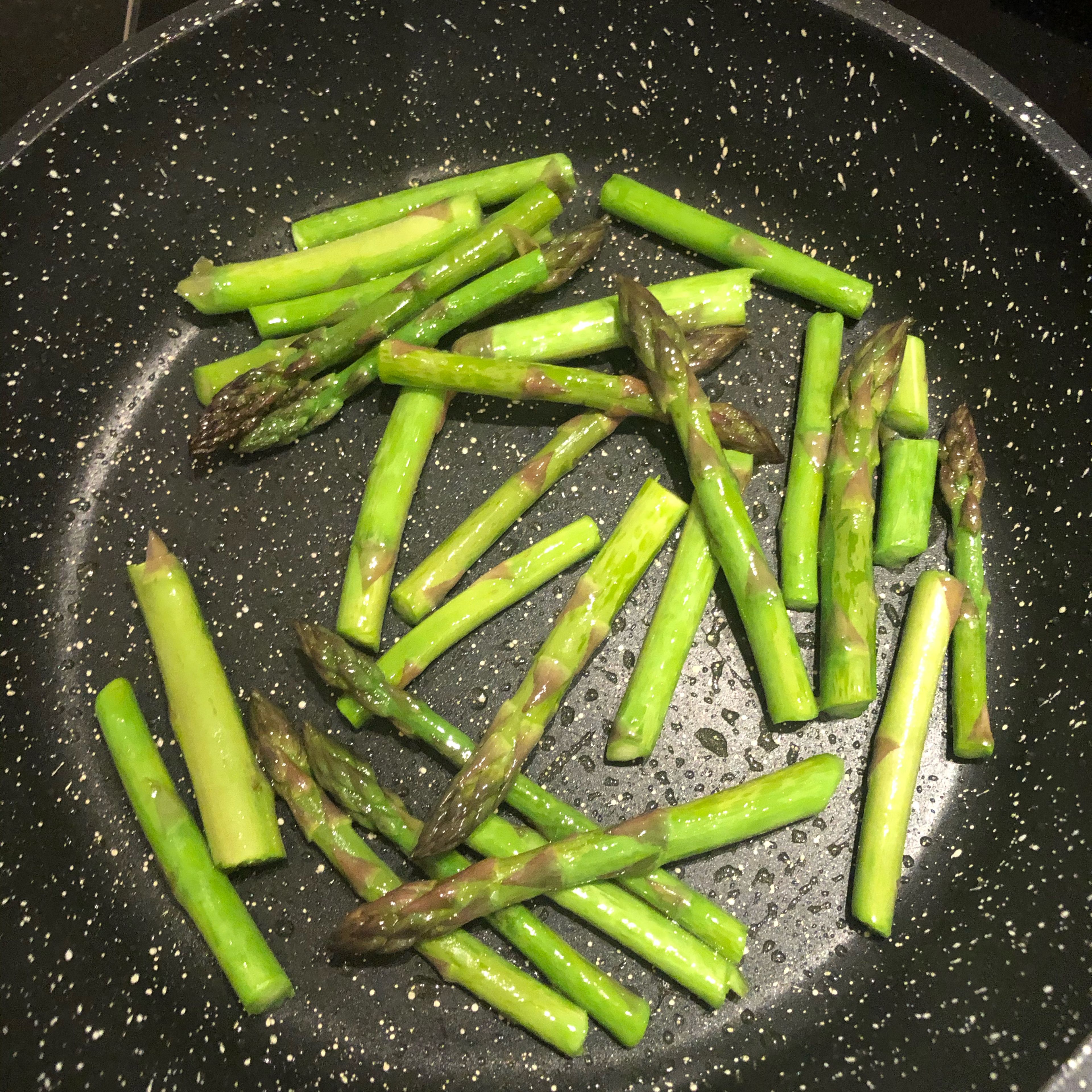 Chop the green asparagus and sauté for a few minutes in virgin olive oil 