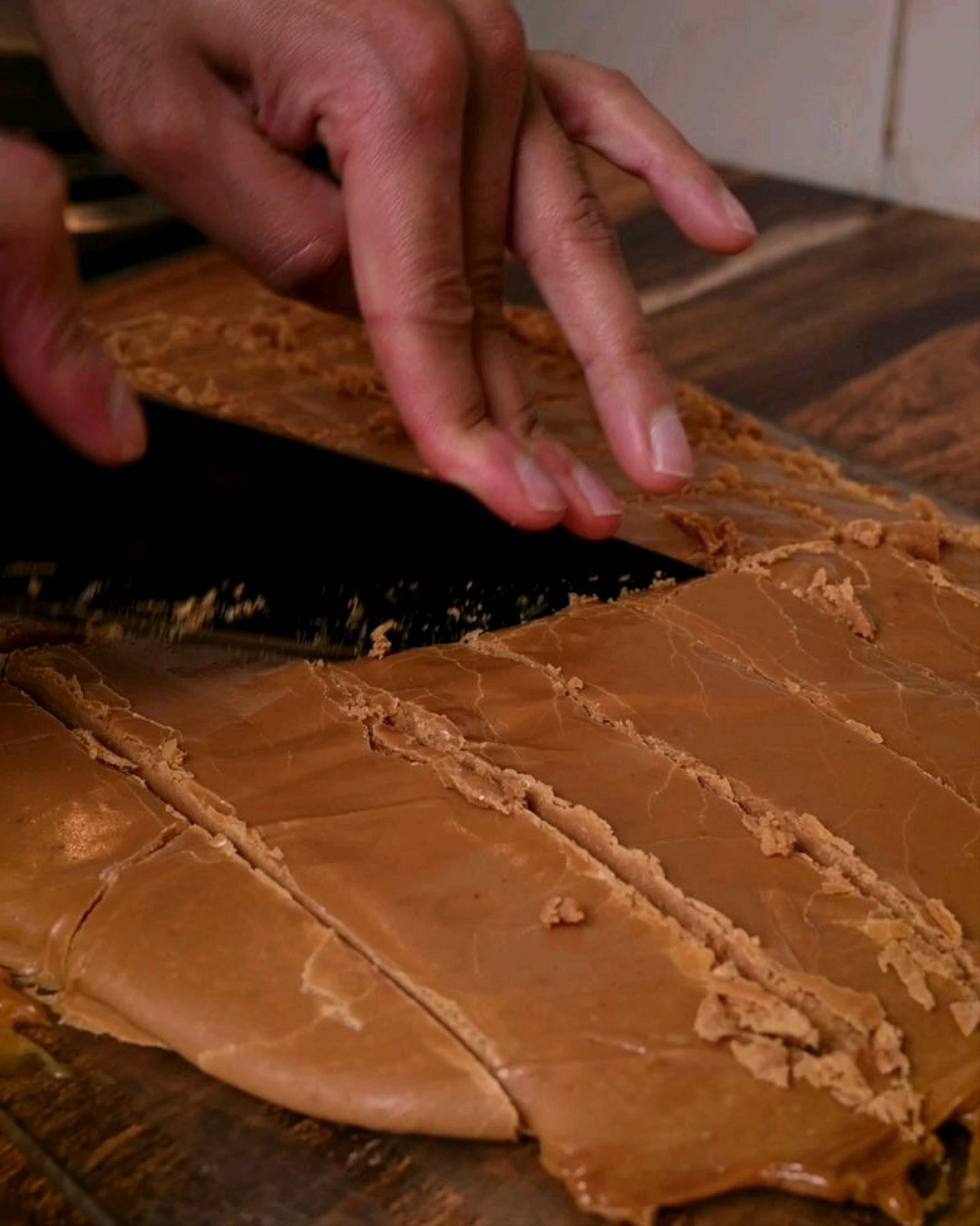 Once the mixture has cooled, cut the milk-toffee into desired sizes and enjoy with a black cup of coffee.