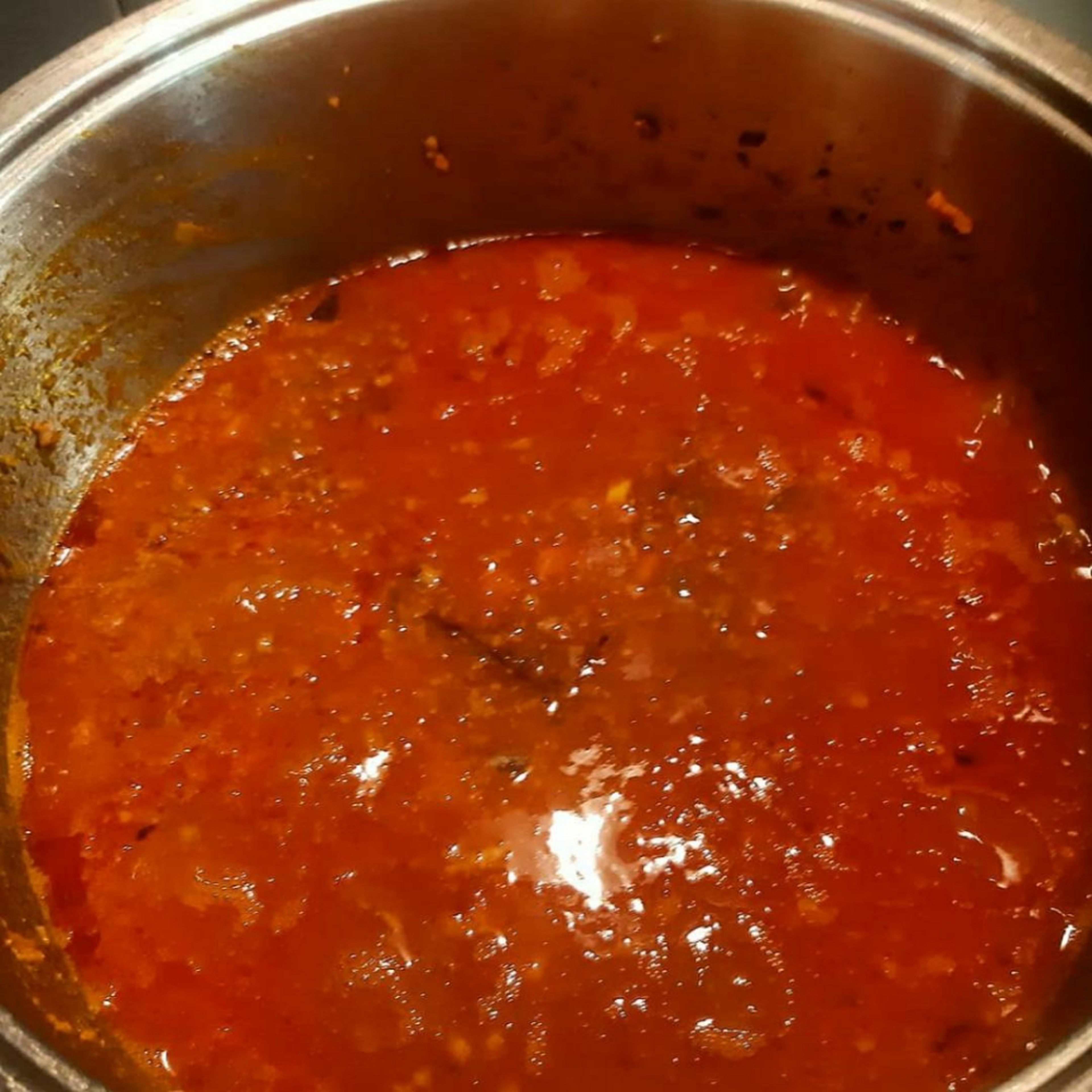 It's now time to add the broth, all at once and leave the sauce cook for at least 3hrs, making sure it doesn't stick to the bottom of the pot. If it dries too much you can add more water. Taste and add salt if necessary.