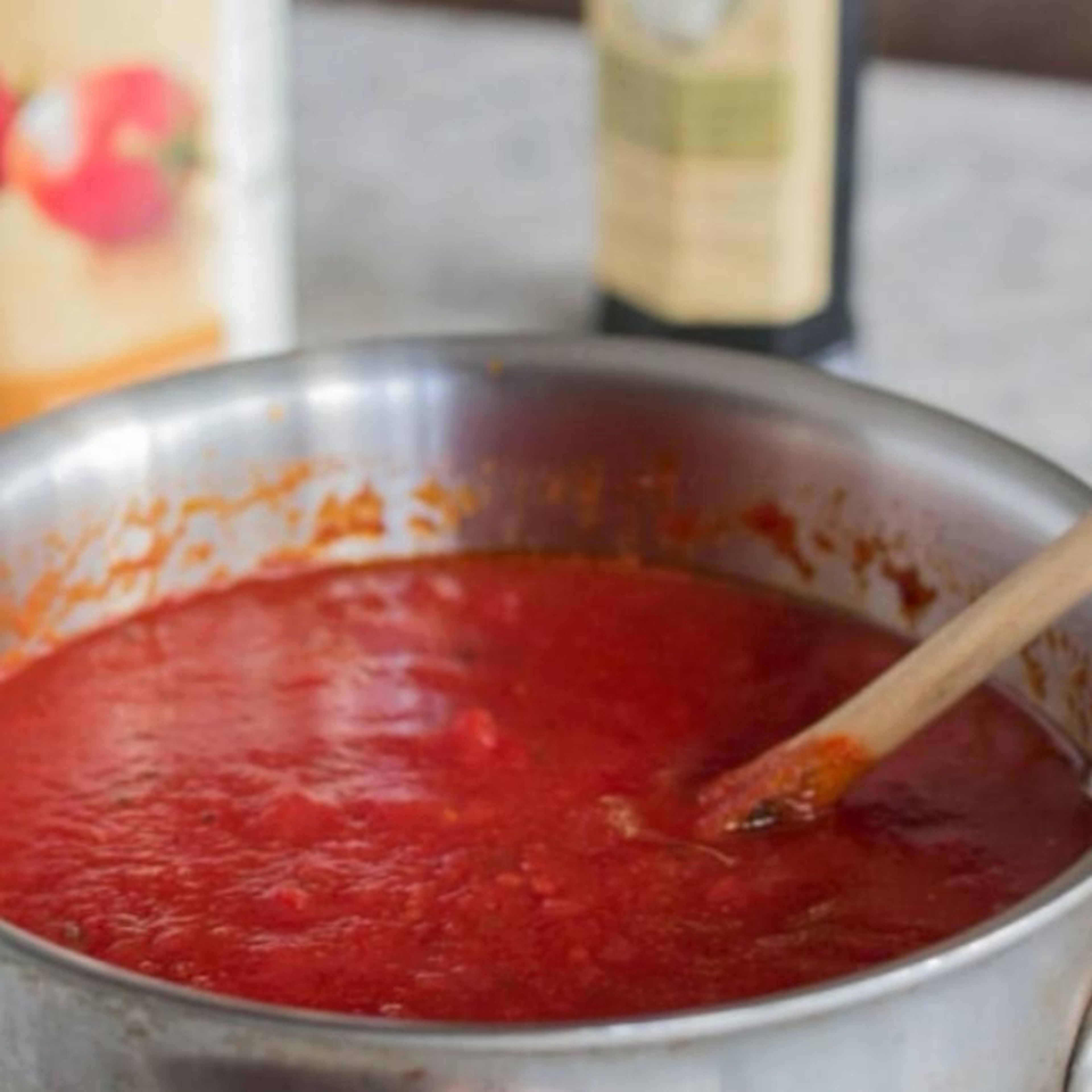 In a separate pan, add olive oil, and one minced garlic clove and tomato paste, cook for a few minutes then add your tomato Passata. season with salt and pepper.