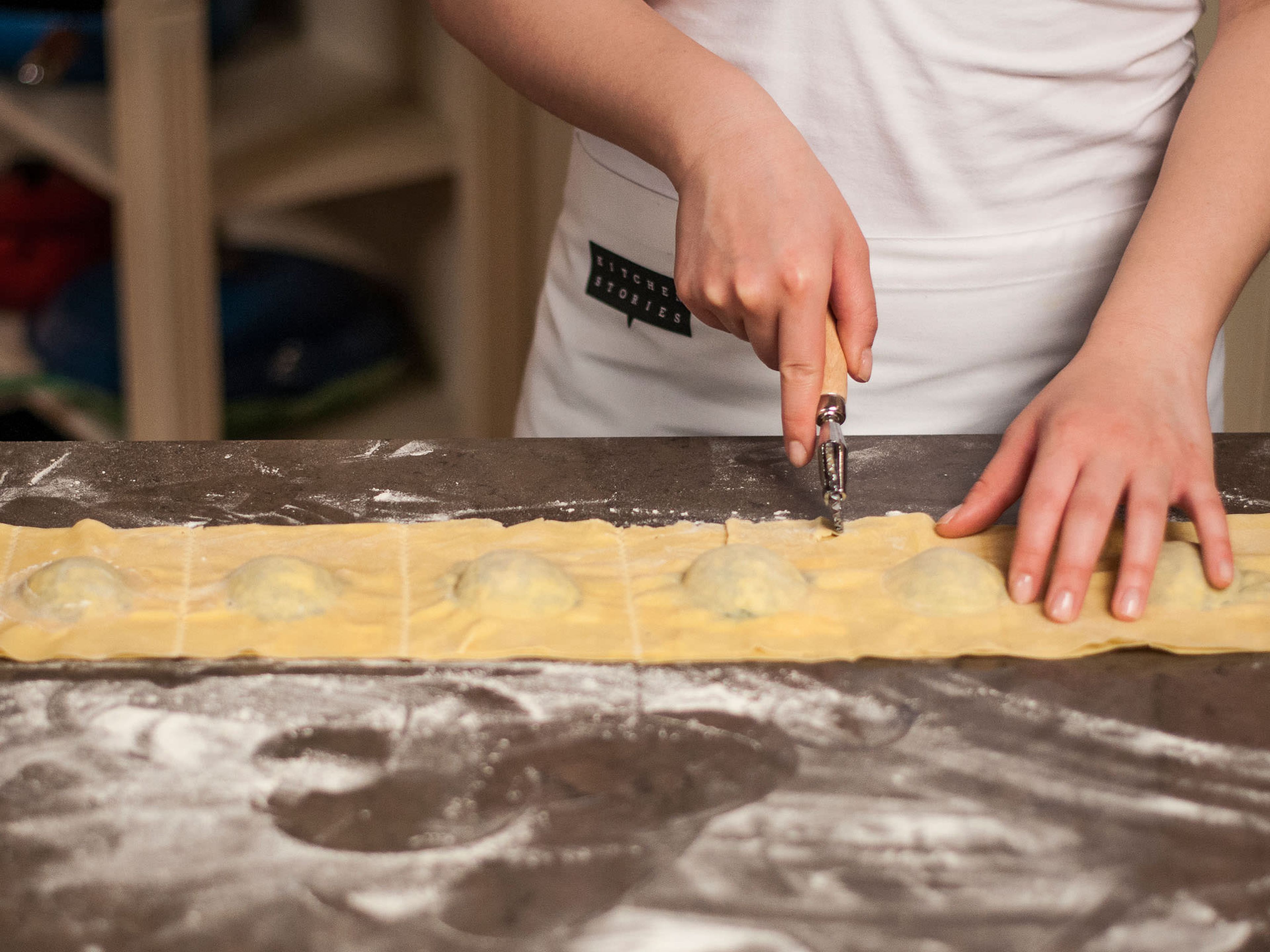 Cut ravioli into squares with a knife or a pasta cutter.