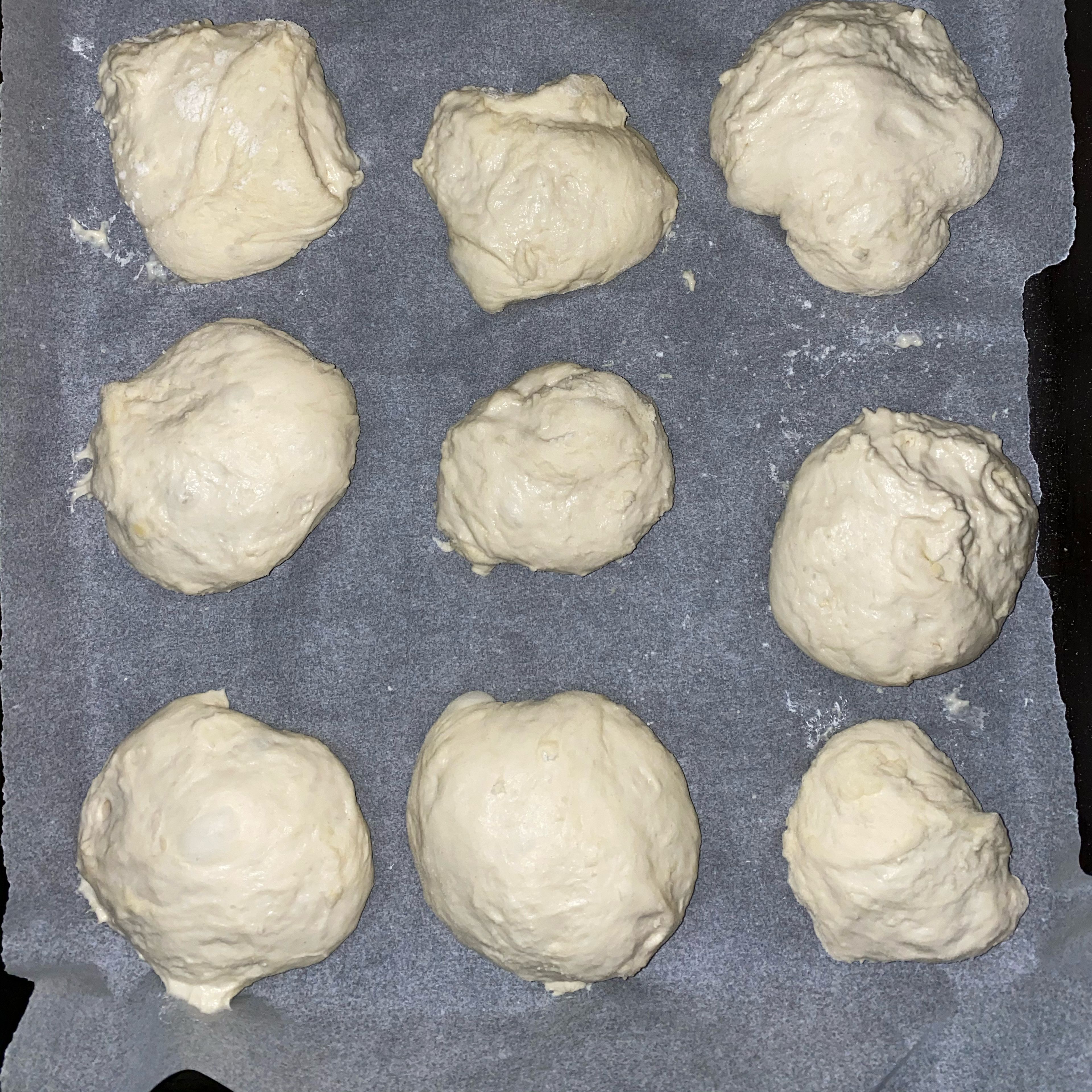 Knead the dough on a generously floured surface for around a minute, then shape as desired. You can make small bread rolls, a big bread bowl, even a ciabatta, or a combination. Place the dough on a parchment lined baking tray and set aside to rest, uncovered, for around 15 minutes.