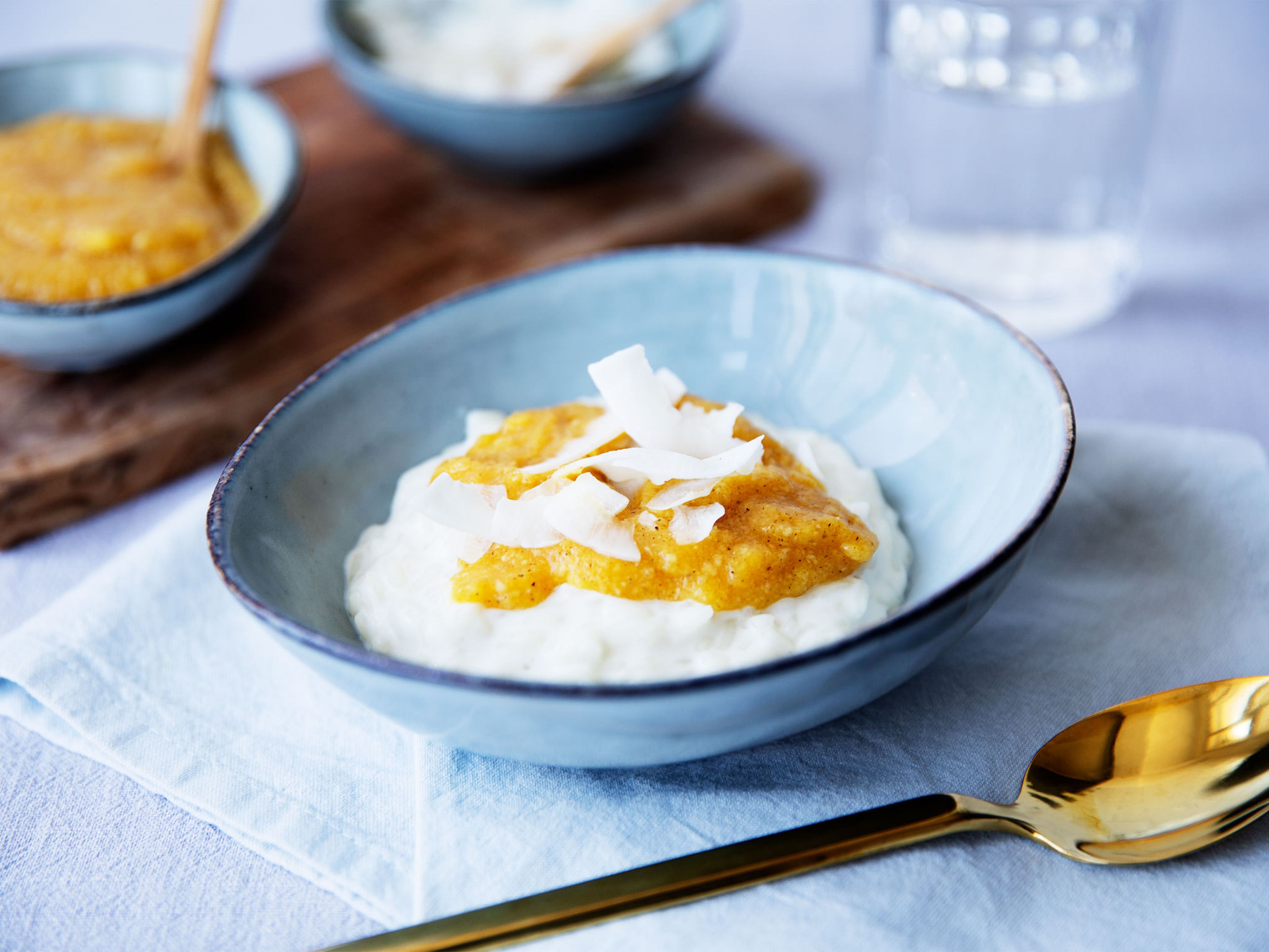 Coconut rice pudding with mango sauce
