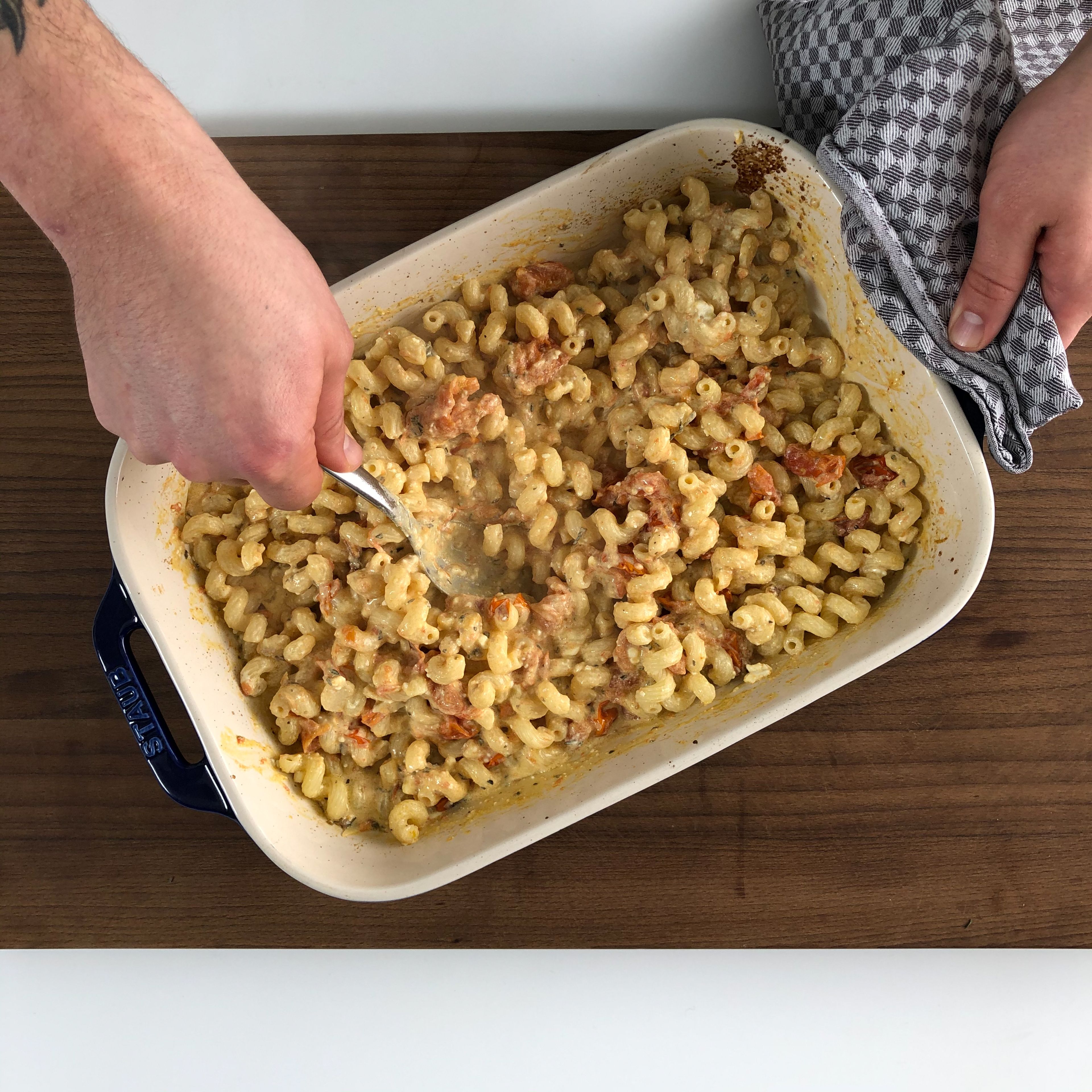 Remove baking dish from the oven and stir to combine all the ingredients. Stir in pasta and serve immediately. Enjoy!