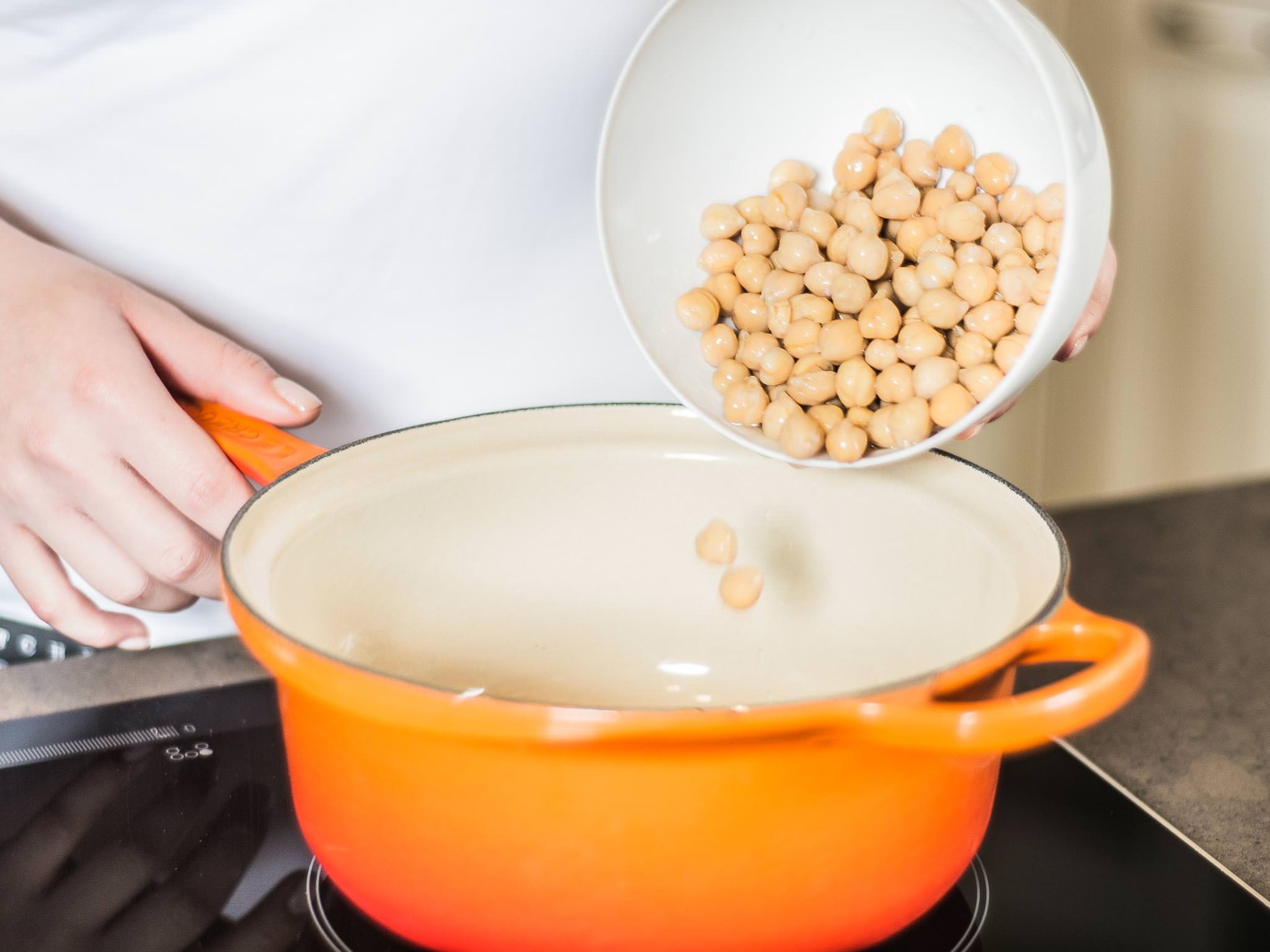 Heat chickpeas in a small saucepan. Add ginger and garlic and toss together. Remove from heat and set aside to cool.