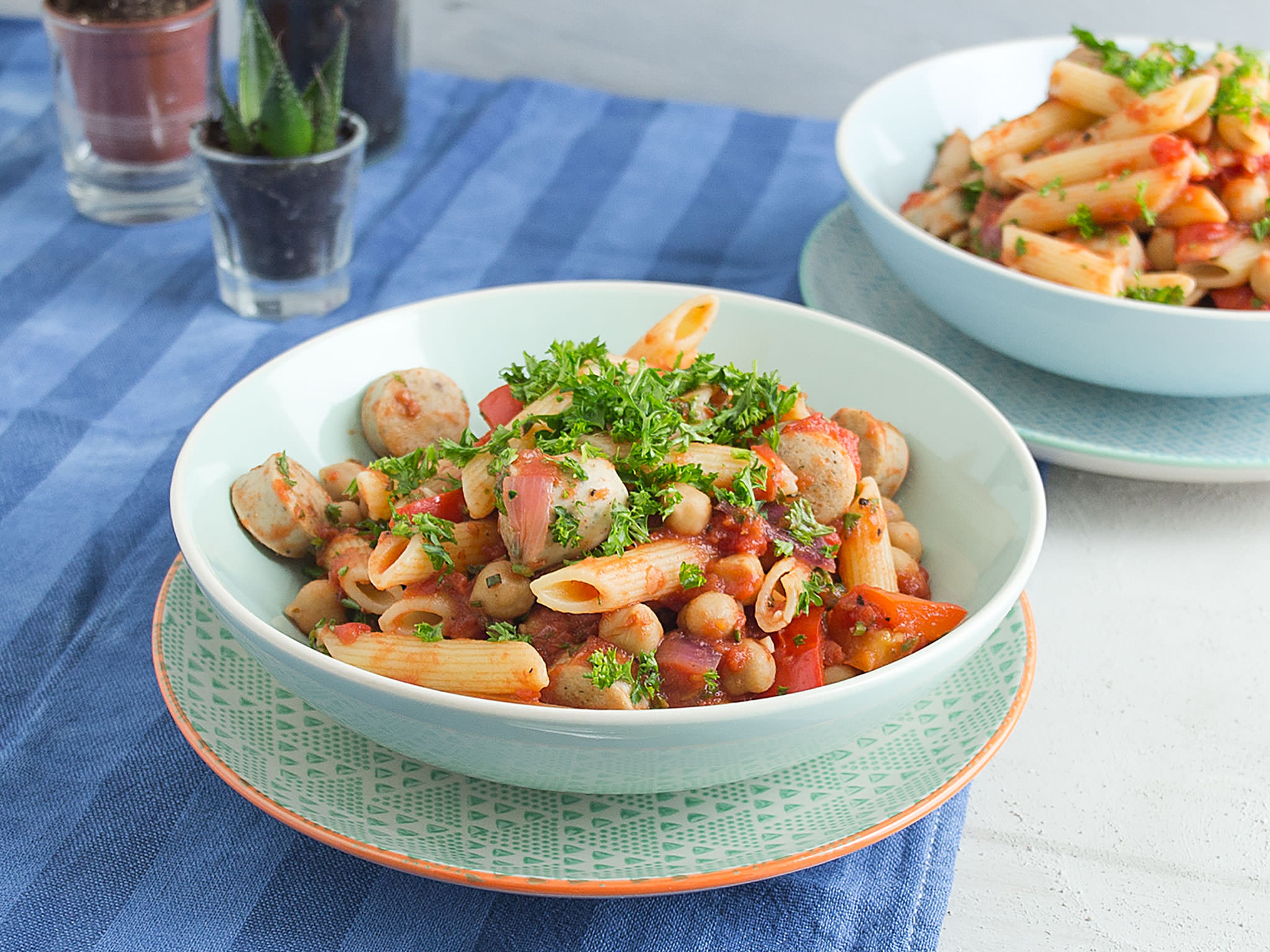 Pasta with sausage, tomatoes, and rosemary