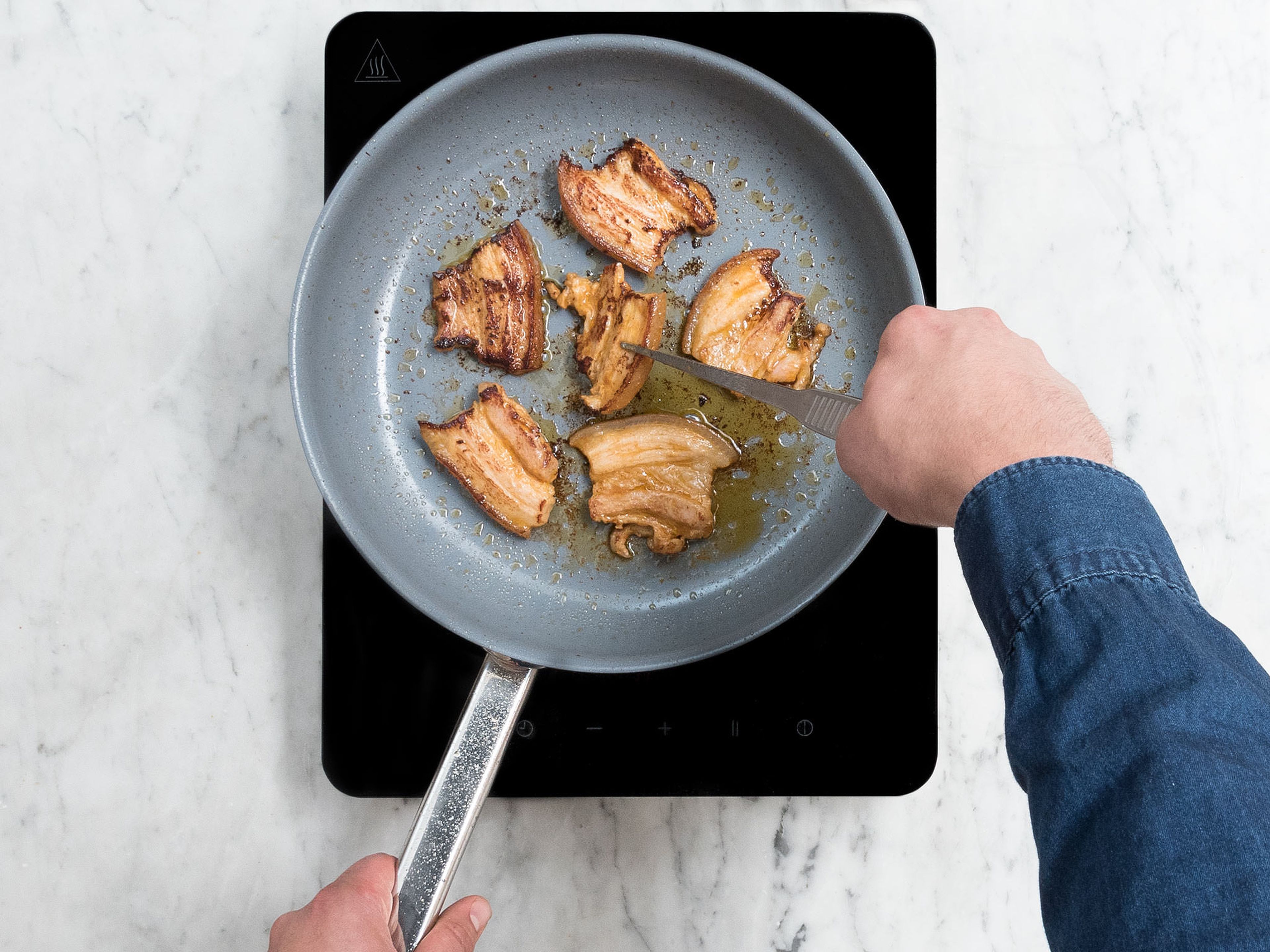 In a frying pan, heat some vegetable oil over medium-high heat. Add marinated slice pork belly and sear for approx. 2 – 3 min. on each side.