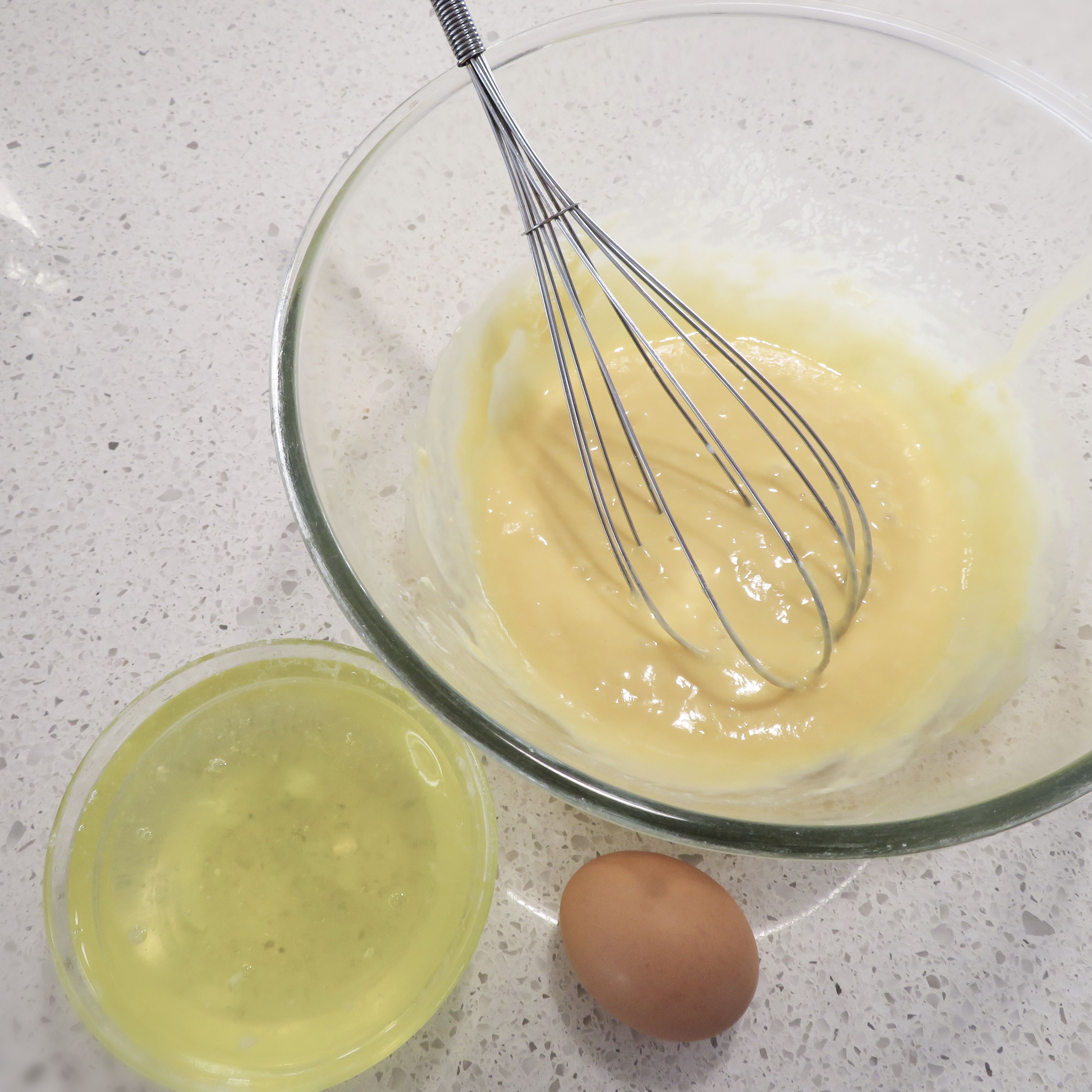 Seperate egg yolk from egg white. Place egg yolk in mixture and leave egg white aside. Then mix together.