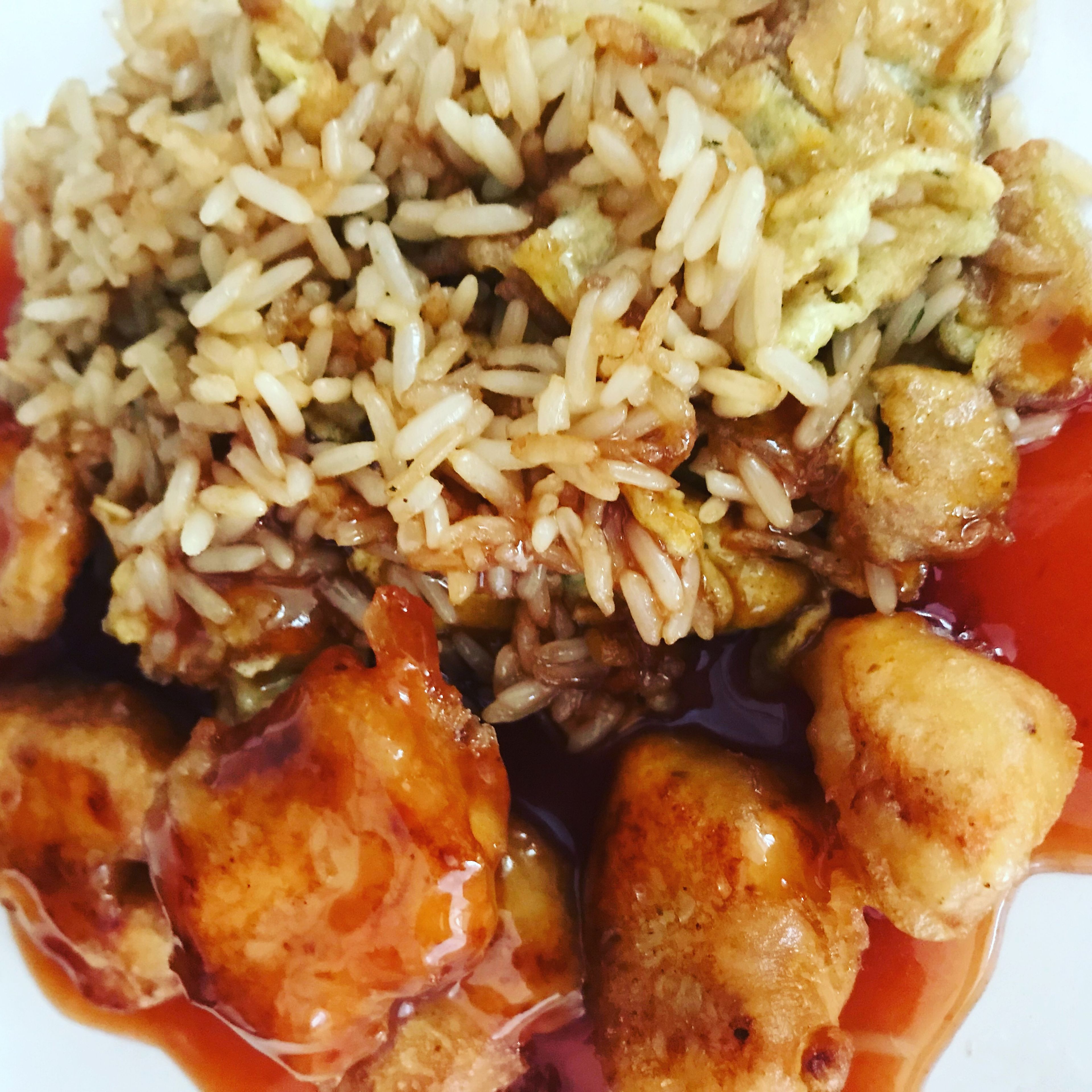 Chinese sweet and sour chicken with egg fried rice
