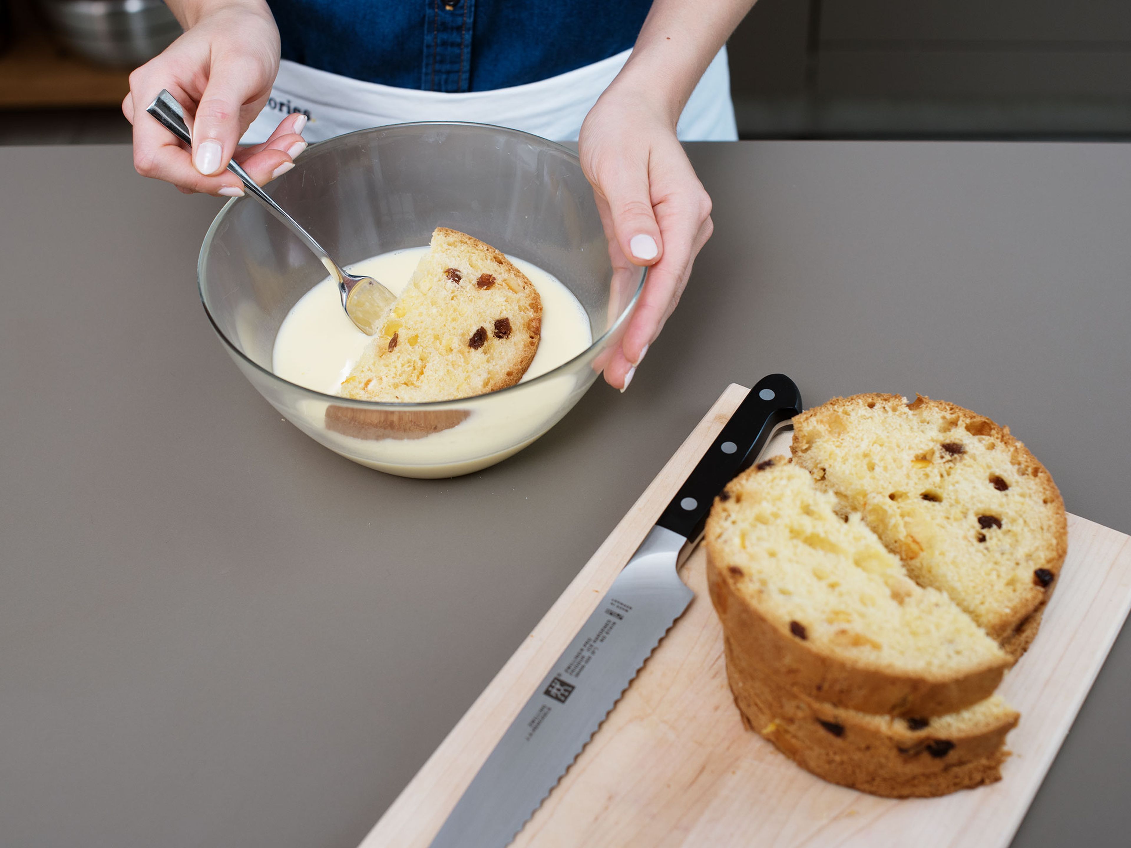 Mix yogurt, cinnamon, and vanilla sugar in a bowl and set aside. In another mixing bowl, whisk together eggs and milk. Cut panettone into 2-cm/0.66-in. thick slices and soak each side in egg mixture.