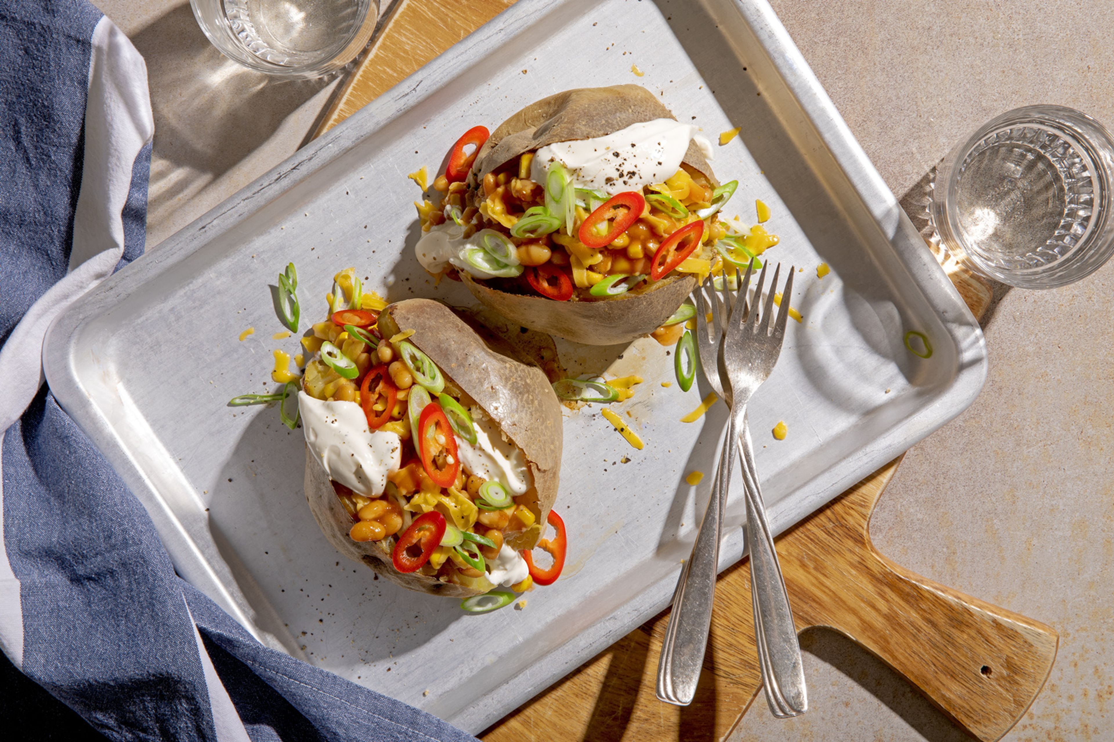 Baked potatoes with corn and beans