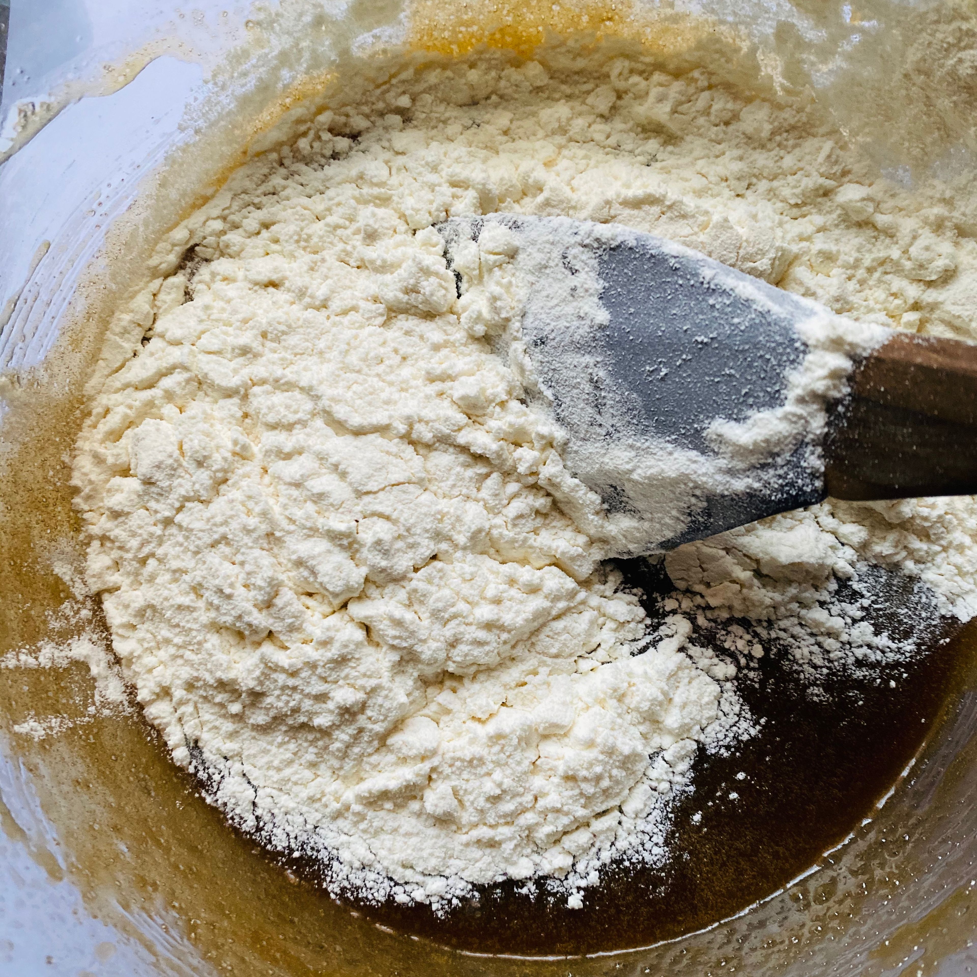 Add the flour mixture to the sugar egg mix and combine until a soft dough forms