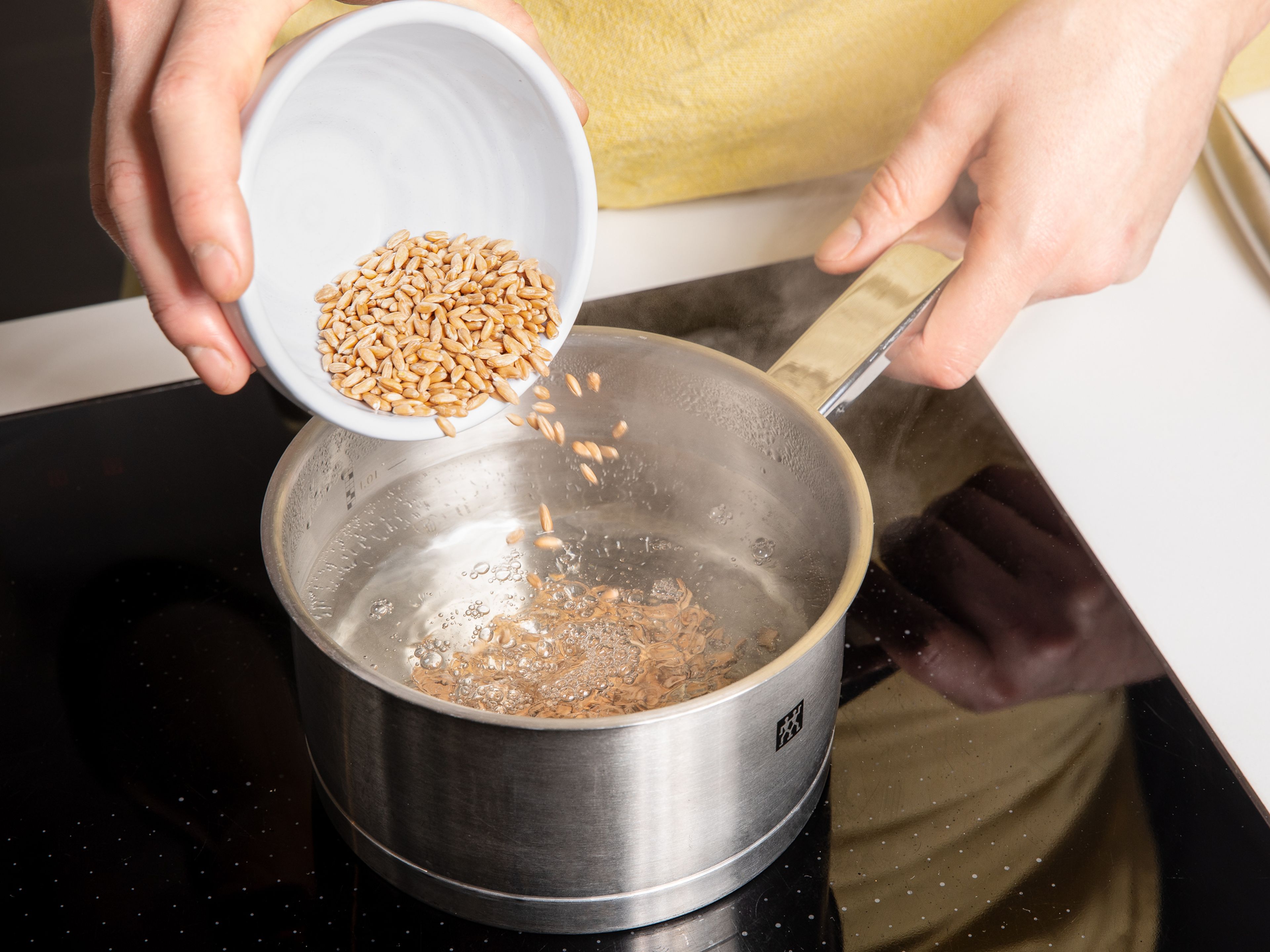 In the meantime, add spelt to a fine sieve and rinse under cold running water. Drain well and add to a pot of boiling water. Cook for approx. 50 min., or until spelt is chewy and cooked through. Drain and set aside.