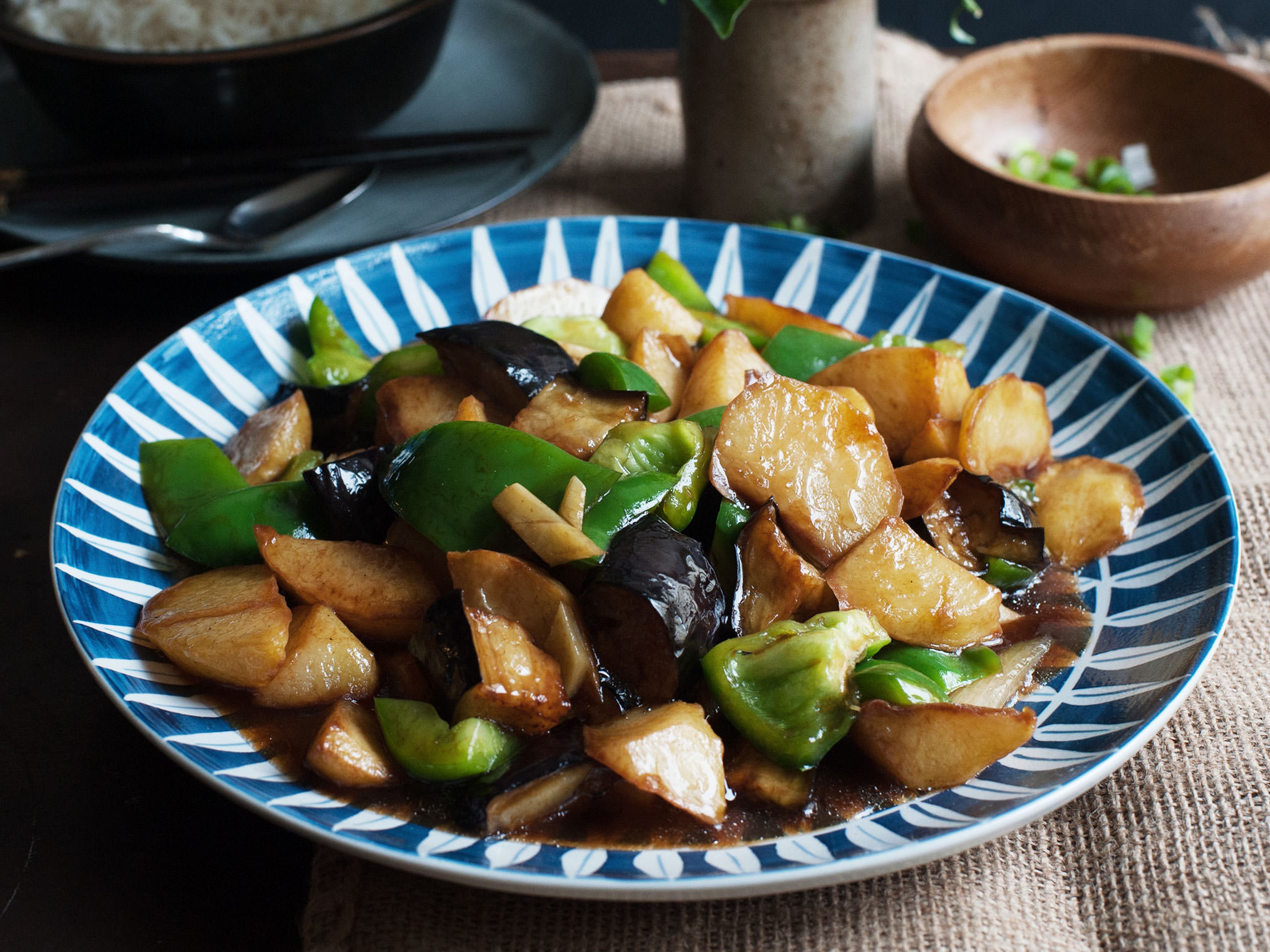 Stir-fried eggplant, potatoes, and peppers