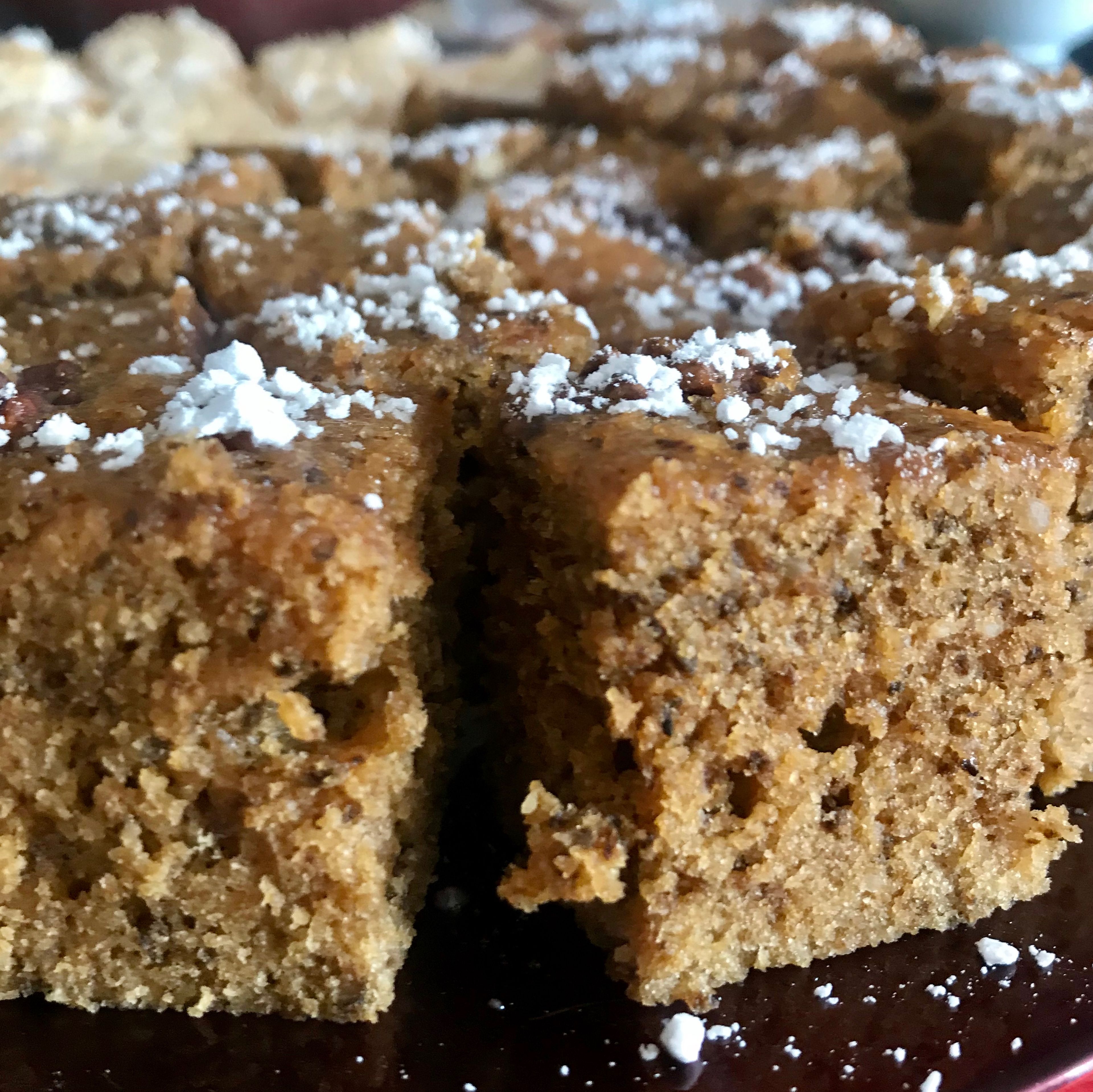 When cooled completely, cut the cake into squares and place on a plate, ready to serve. You can also top the cake squares with confectioner’s sugar, if you like.