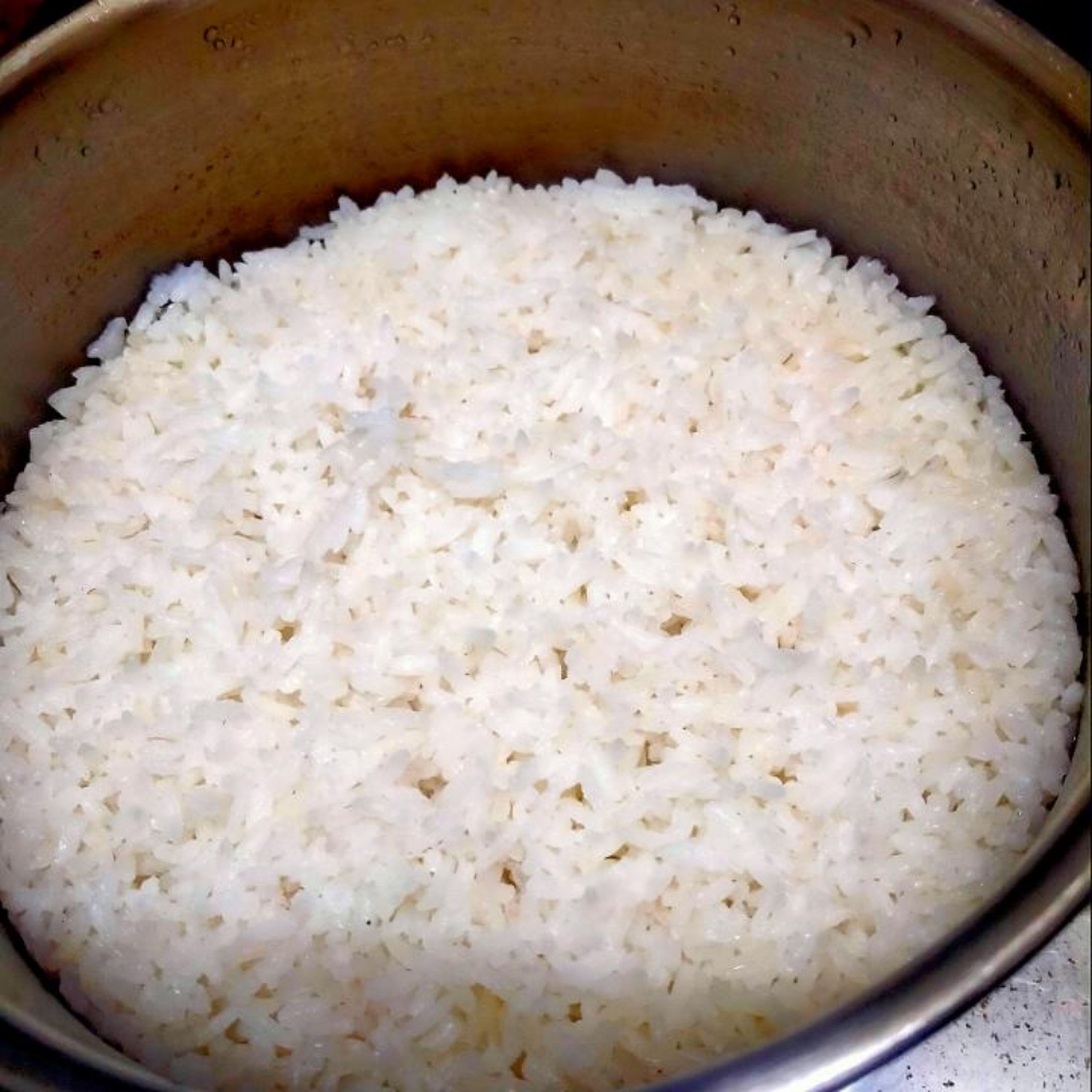 first cook the rice(Egyptian rice) in the rice cooker or boil/steam it or stir the rice with one tbsp vegetable oil on medium heat for 2 minutes then add 1 1/2 cup water bring it to boil for 1 minute then cover it and reduce to low heat for 15 - 20 minutes and let it cool for 20 - 30 minutes