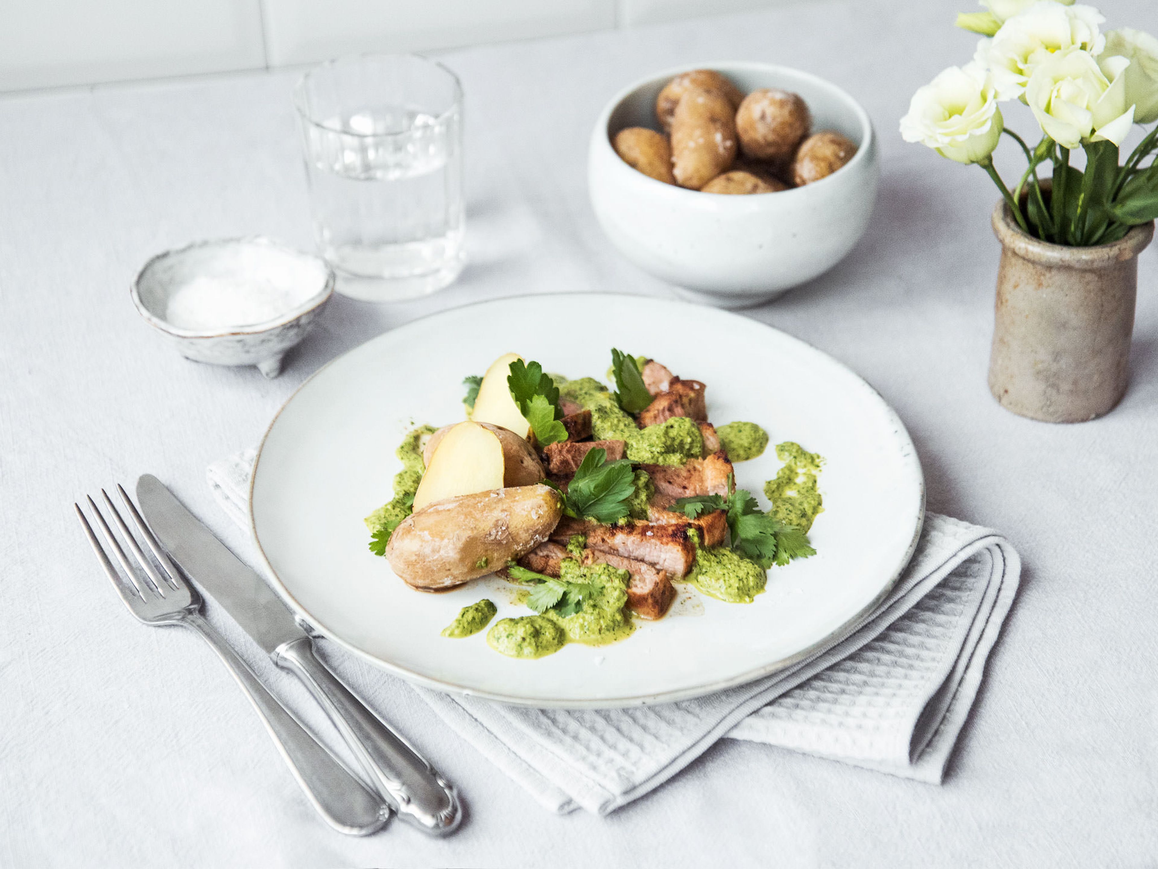 Spicy pork chops with Canarian wrinkly potatoes and mojo verde