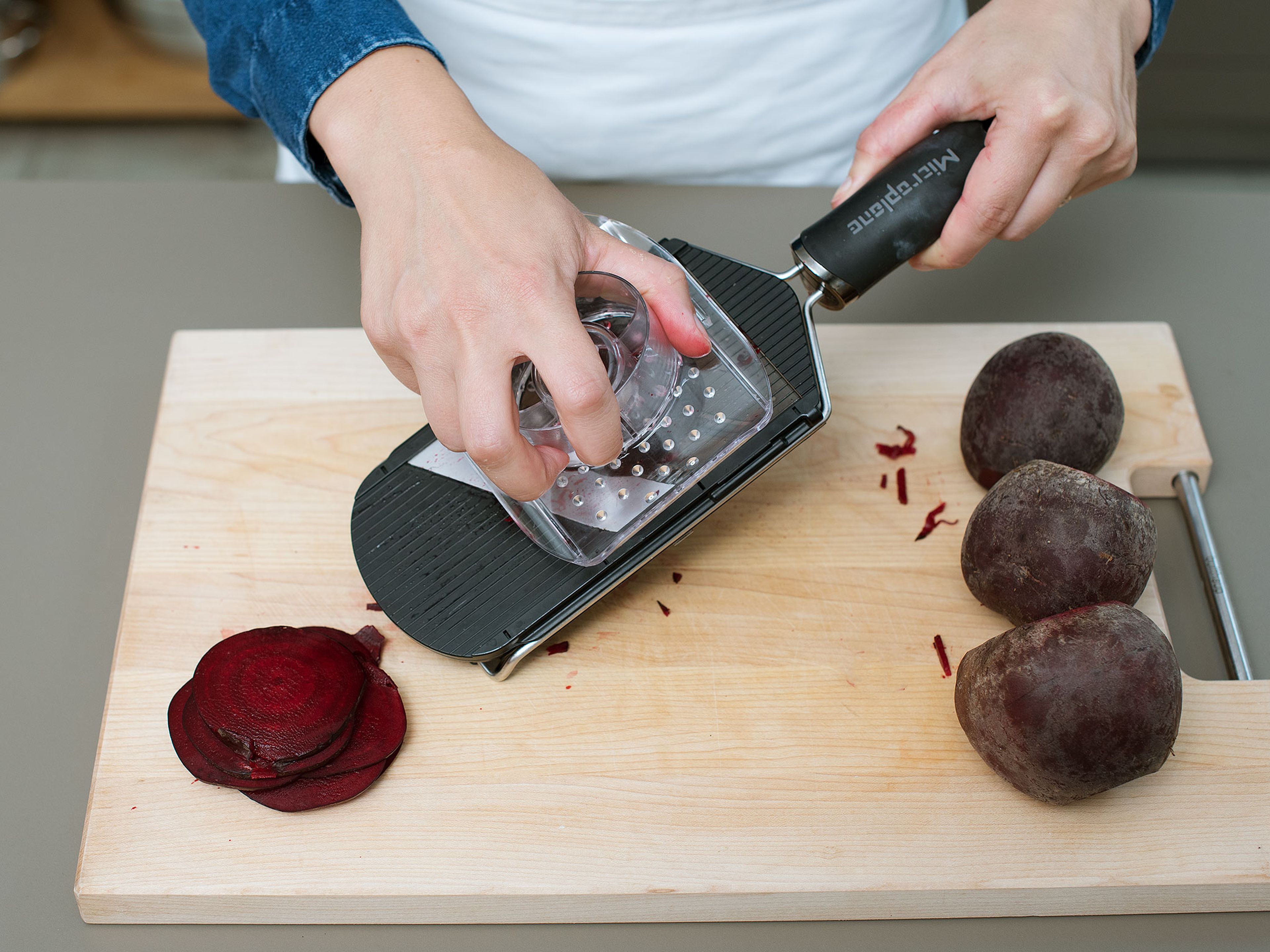 Wash beets, pat dry, and cut off the ends. Slice very thinly with a mandolin.