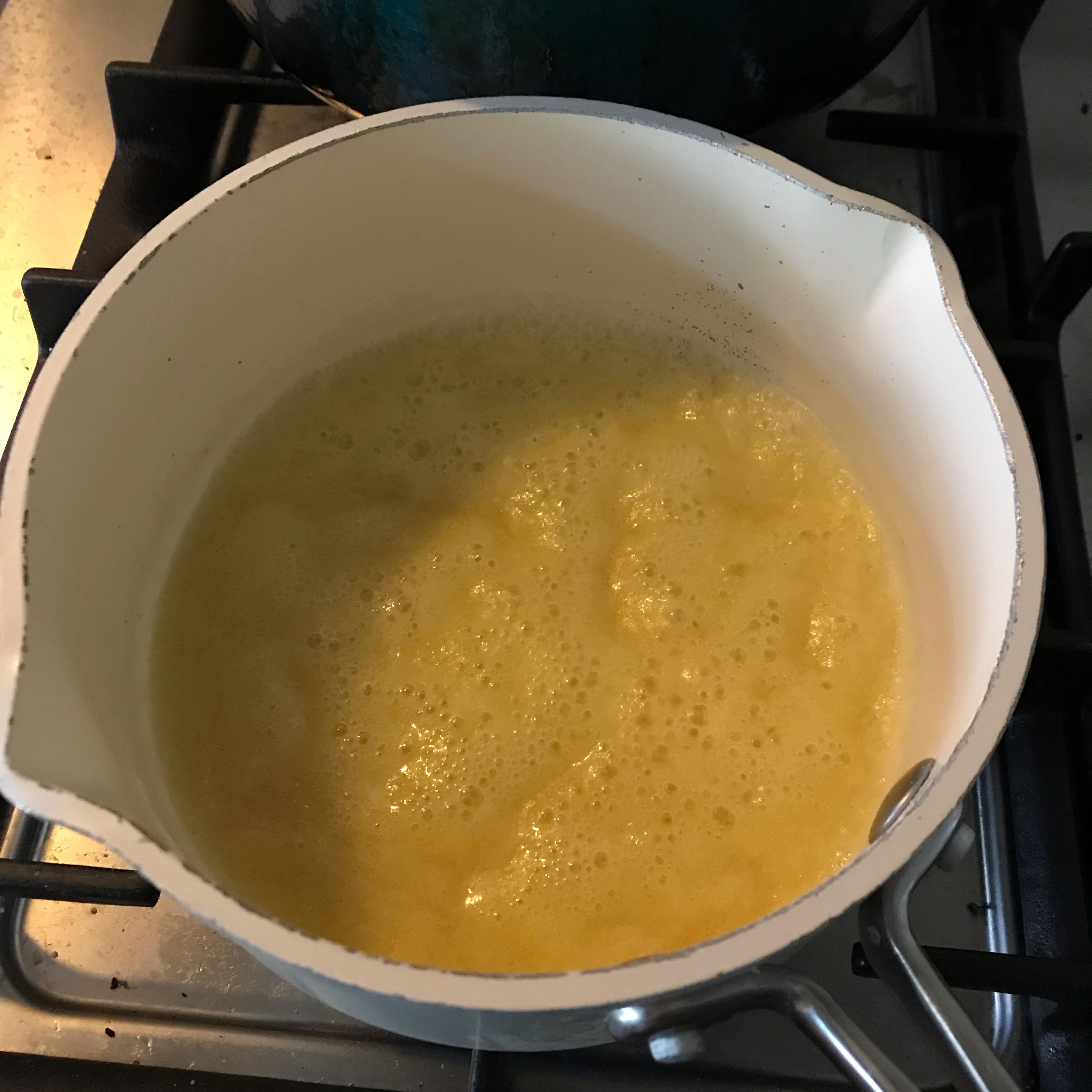 Melt the butter in a saucepan.